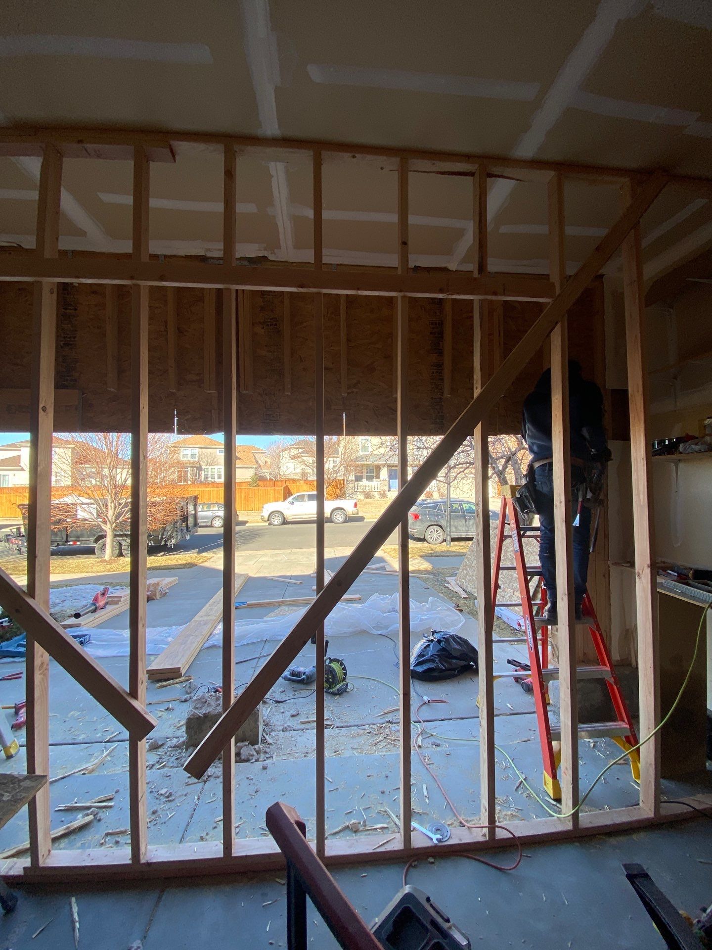 Garage door conversion by David & Goliath Contracting 