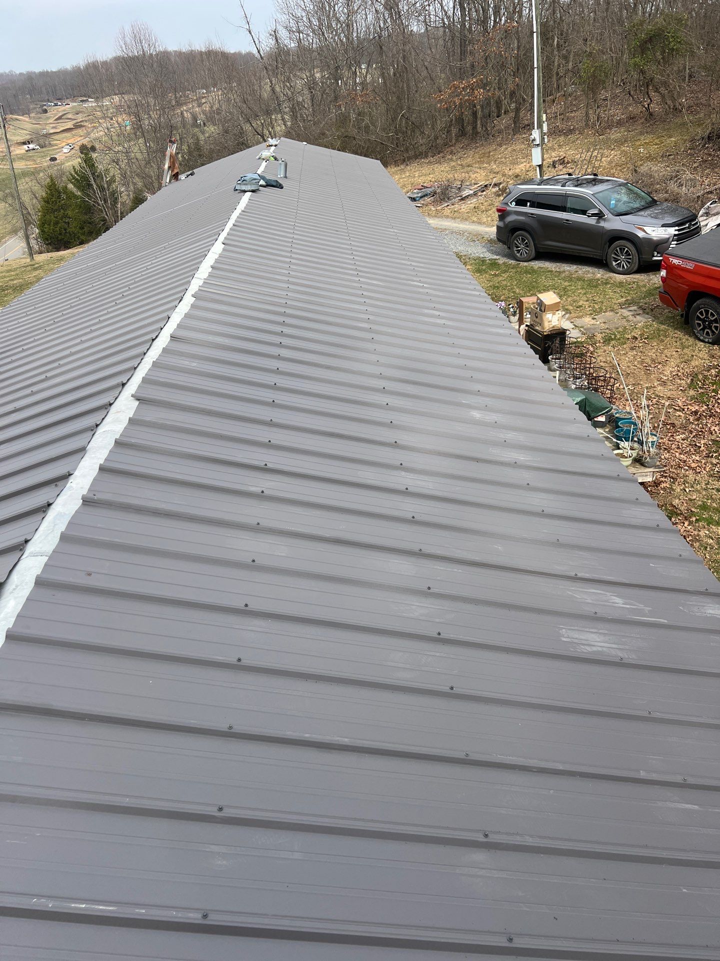 Textured Charcoal Gray using 29 Gauge AG Panel by Omnia Roofing