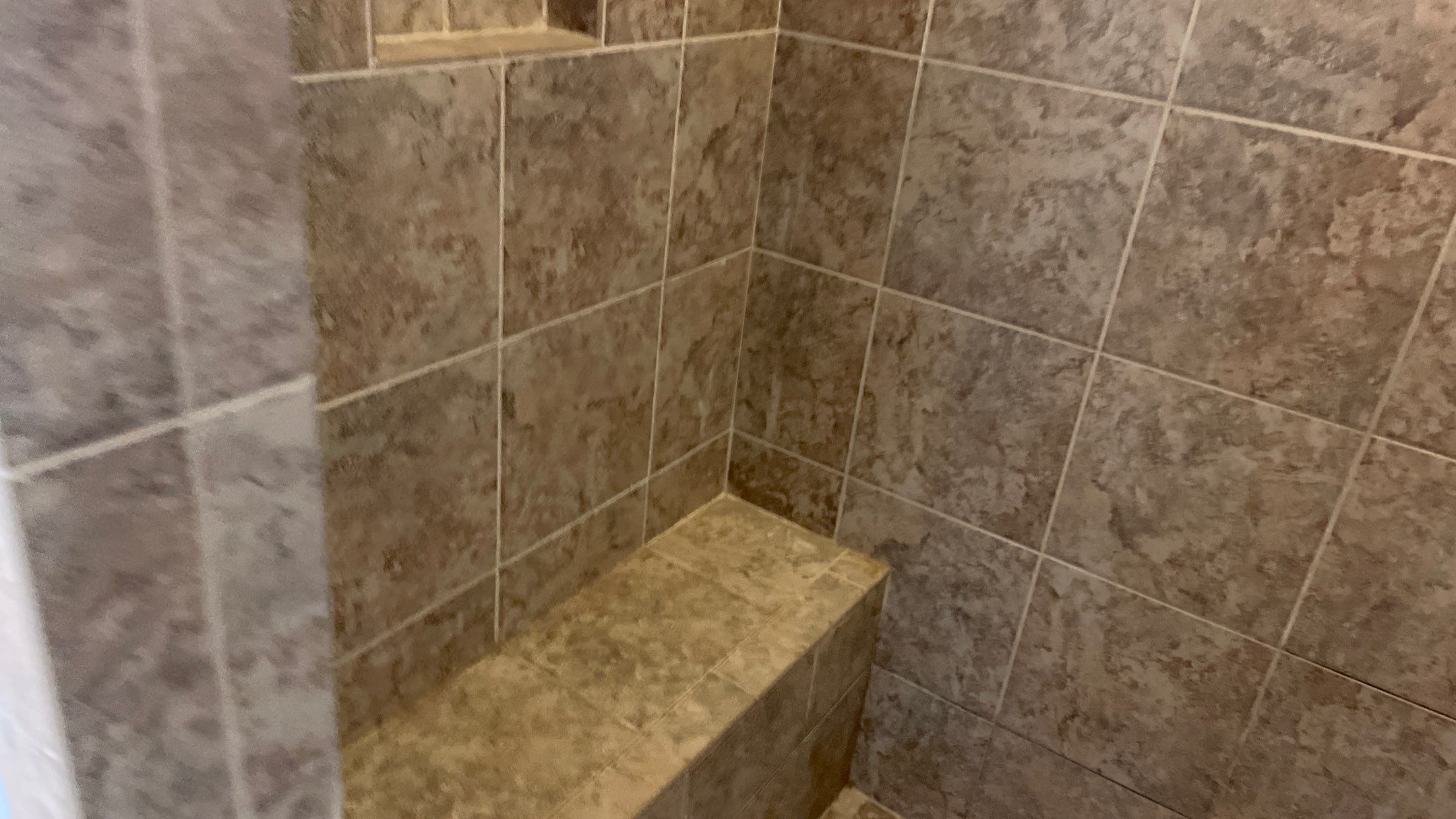 Bright Bathroom Remodel with Wall Removal, Stand Alone Tub and New Vanity by Footprints Floors of Coastal Carolina