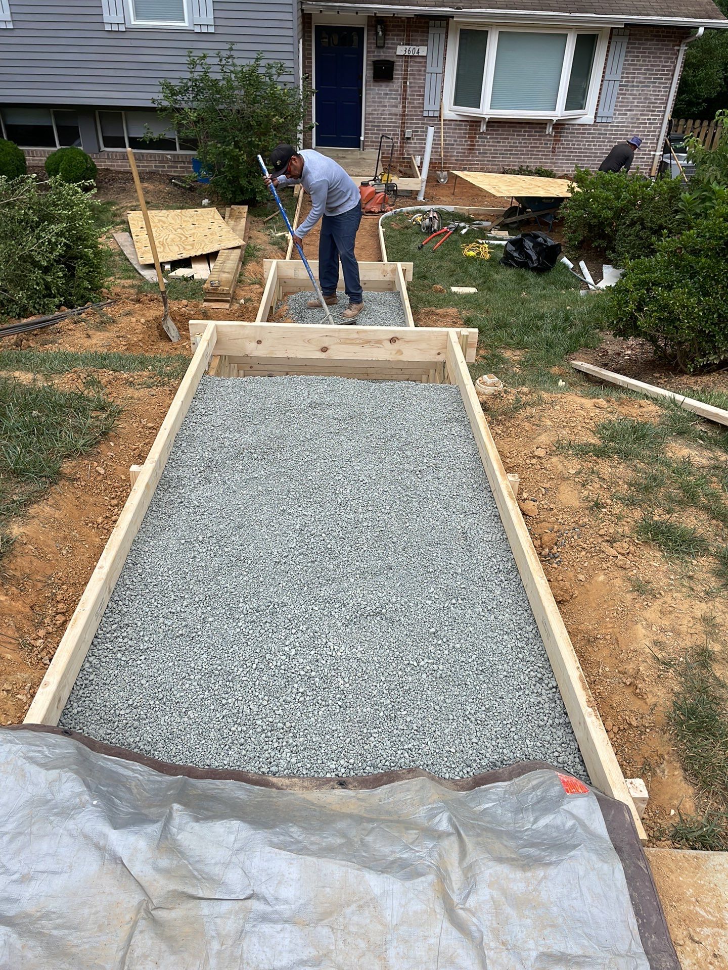 New walkway with stairs and a new front porch by Fairfax Contractors, LLC