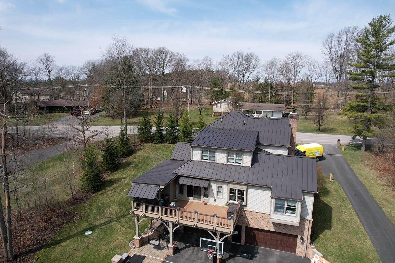 Metal Roof Replacement  by American Home Contractors