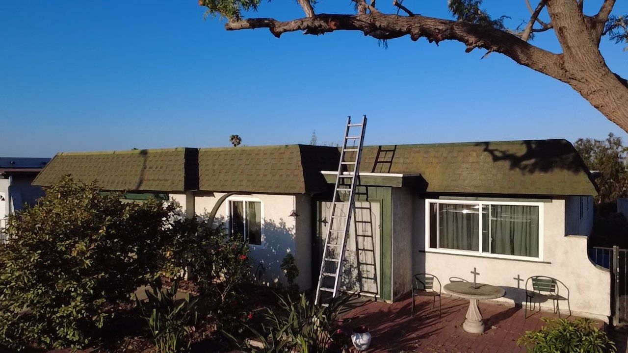 Oceanside Mansard TPO & Shingle Roof Replacement by Zenith Roofing Services