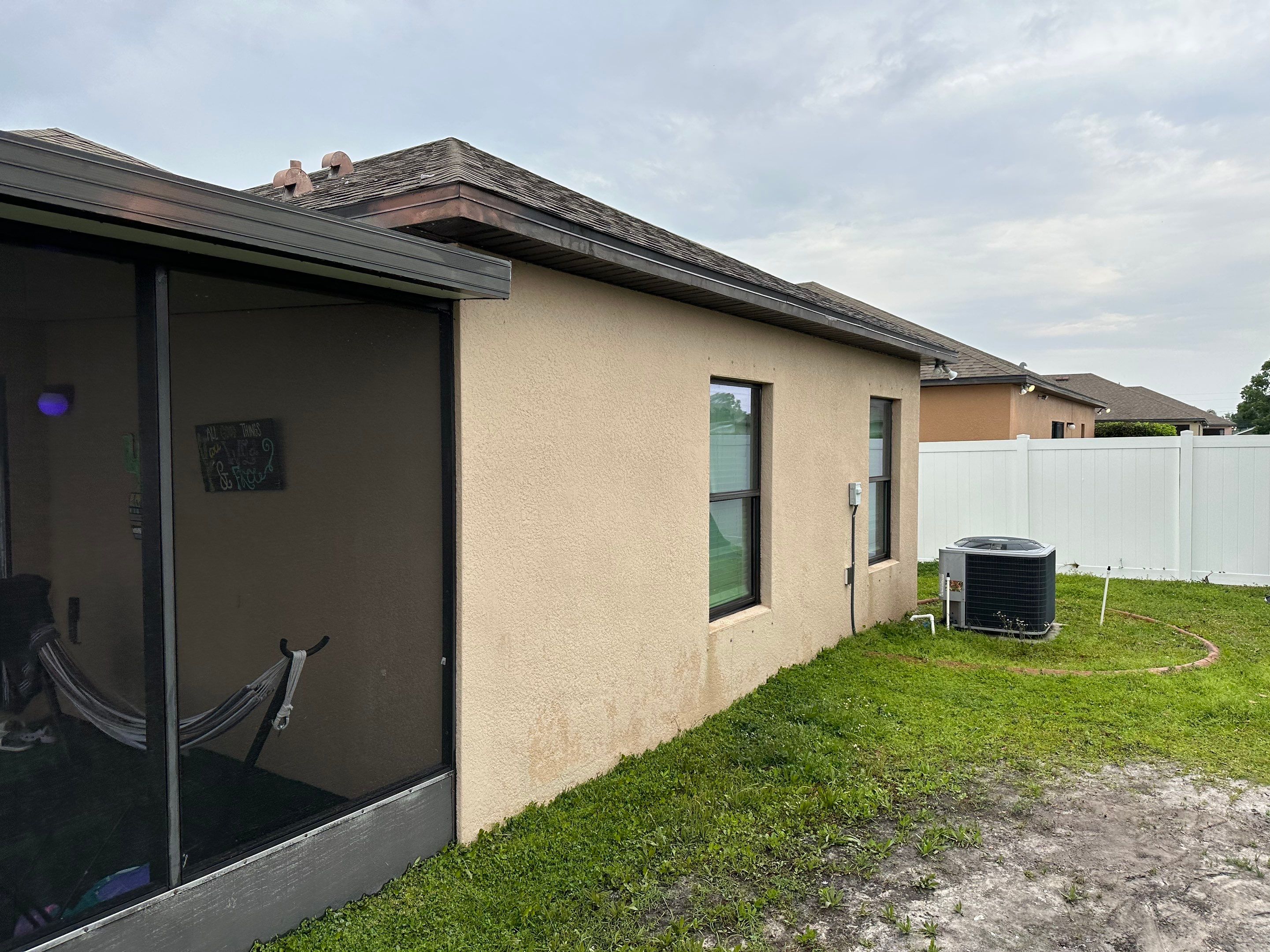 House Wash & Driveway Cleaning in Palmetto Estates Community, Palmetto, FL by Sunshine AquaWash
