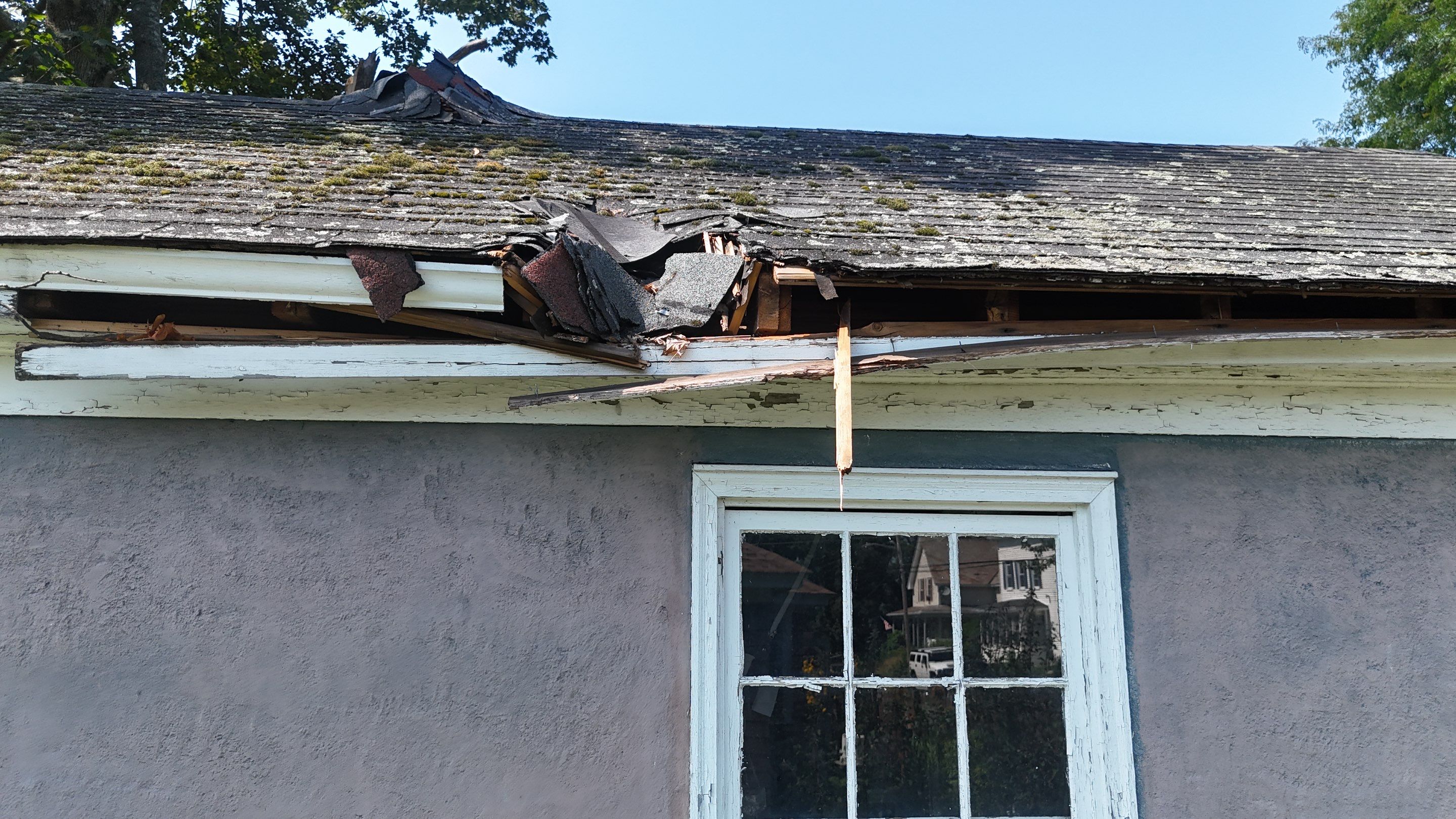 Garage Roof Replacement & Trim Repair by Mighty Dog Roofing of Greater Middlesex County