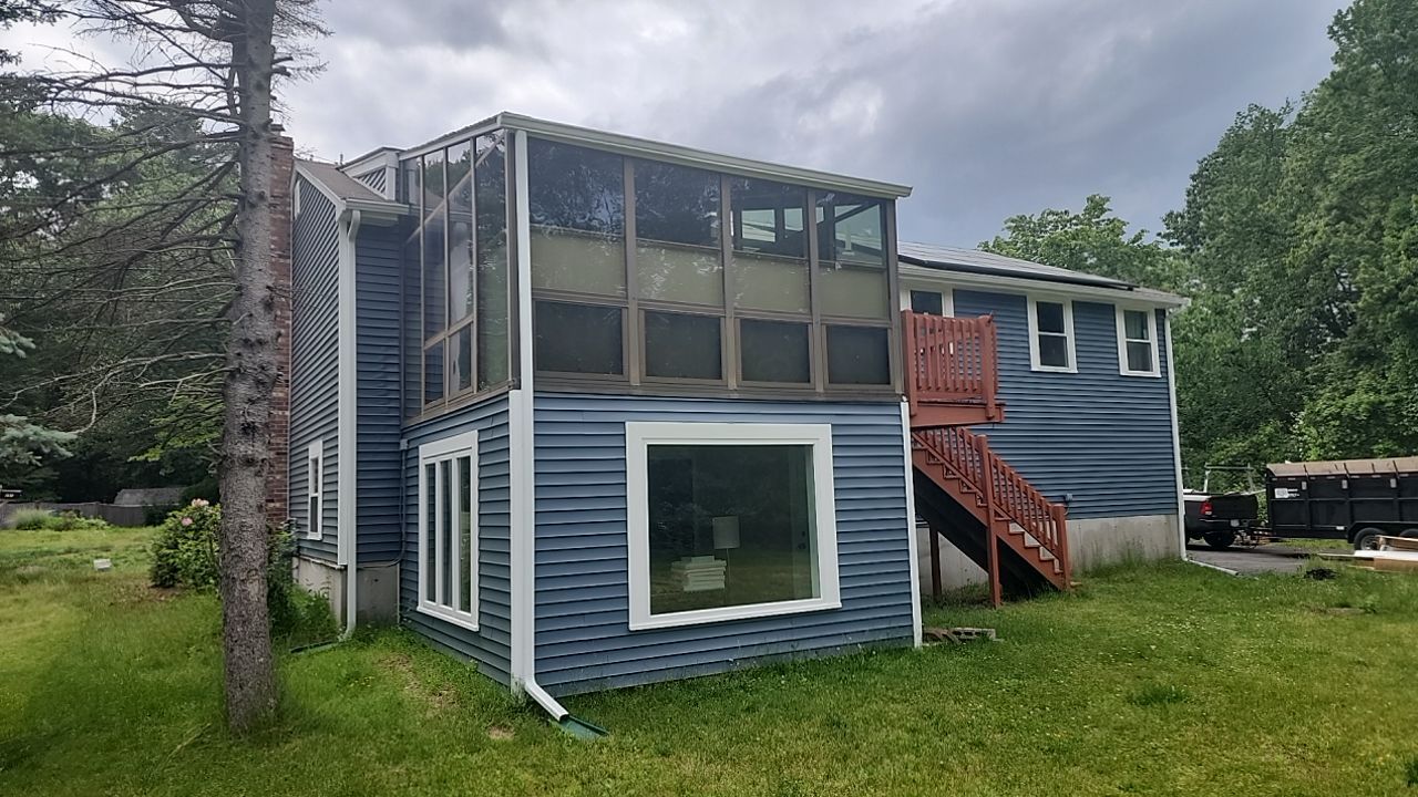 Siding and windows replaced by UBrothers Construction