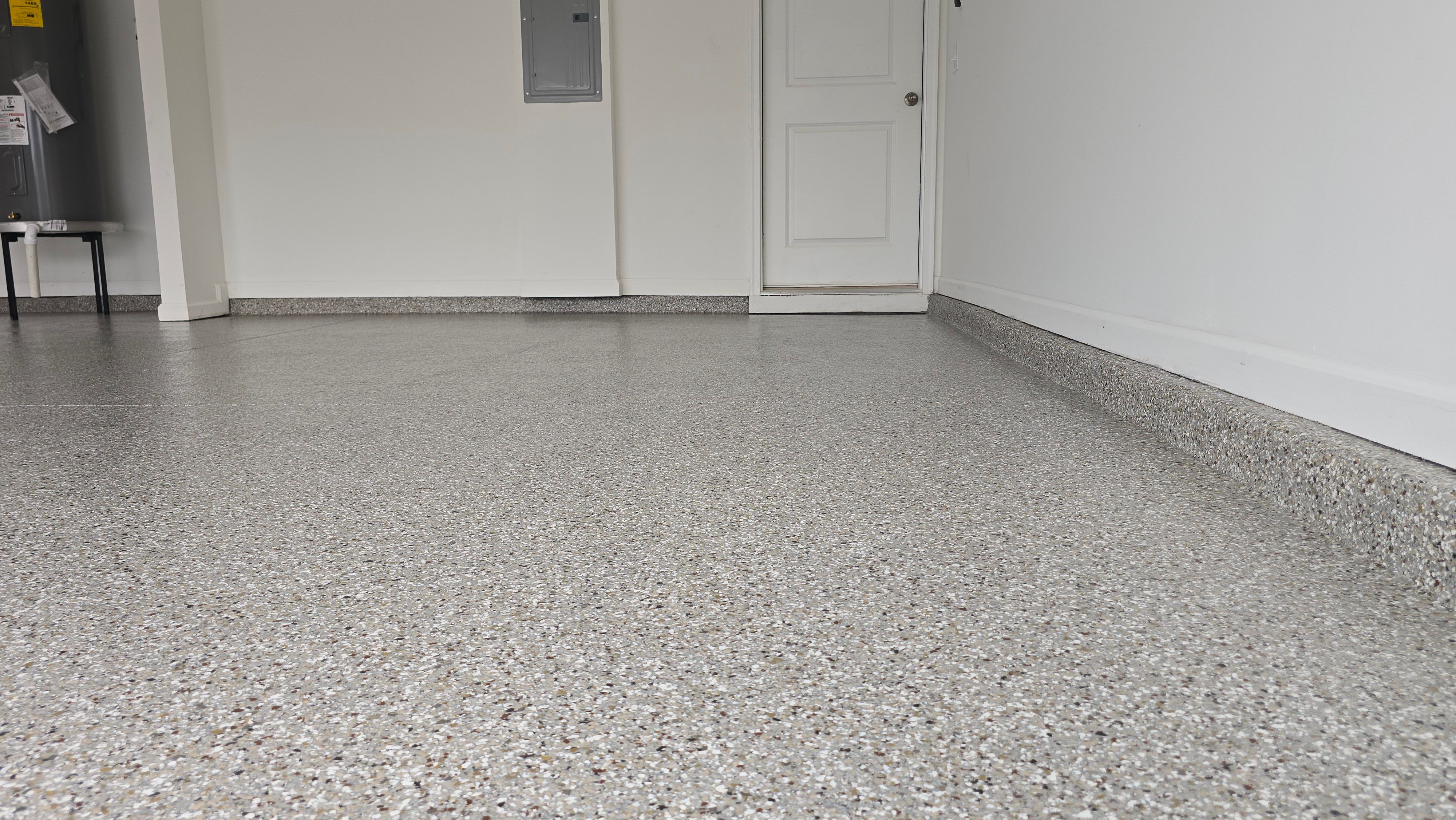 Garage Using Creekbed by Elite Floor Solutions