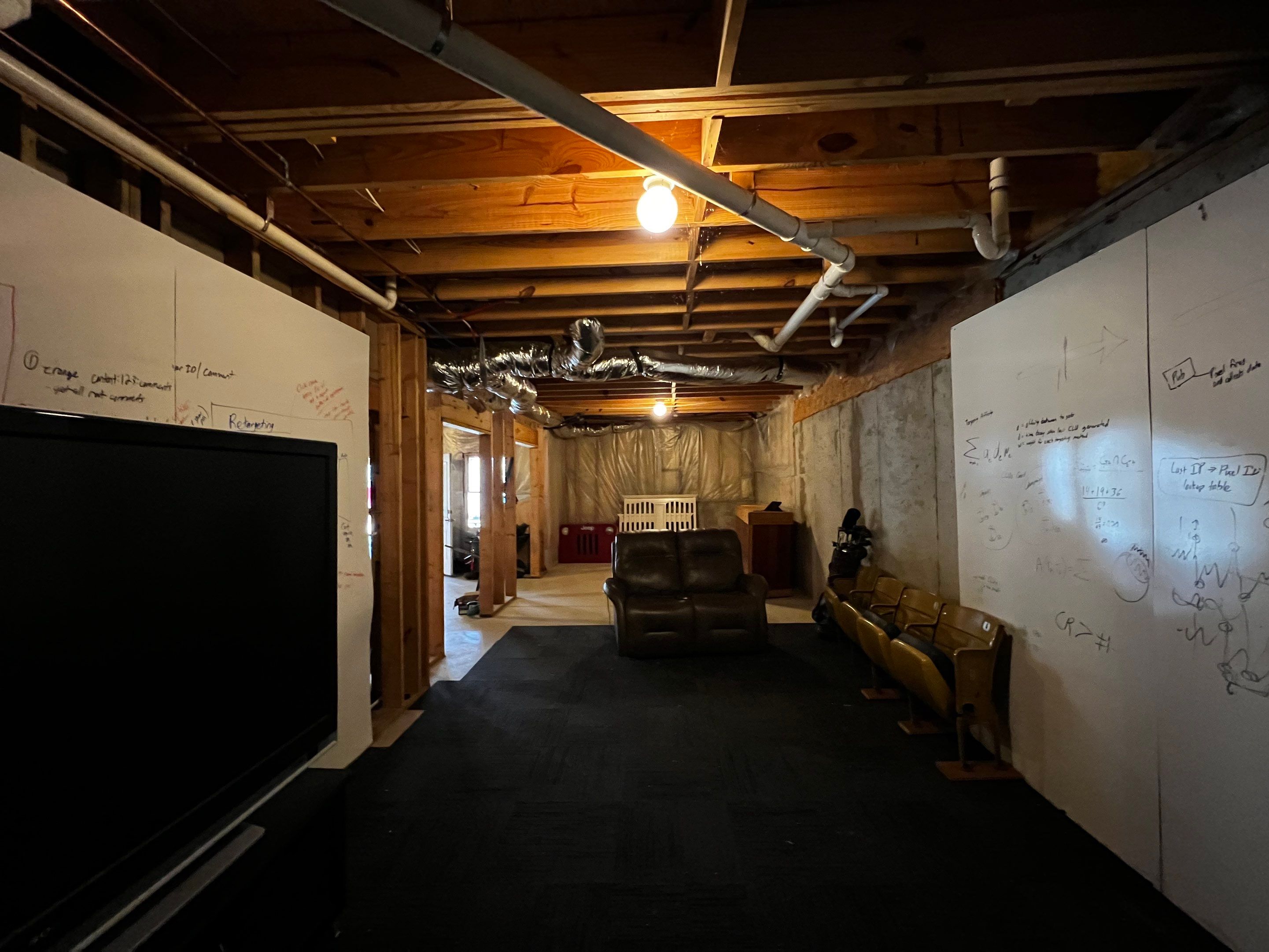 Custom Basement Remodeling With Home Theater and Bar in Woodstock by Swift Home Renovations