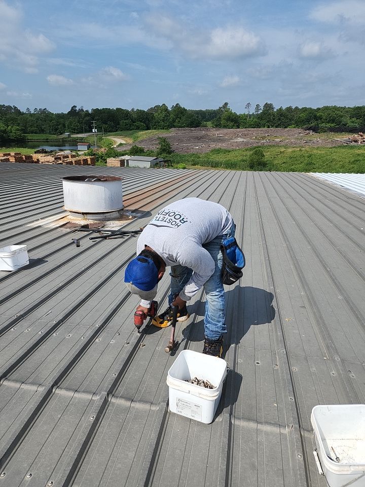Commercial Roofing Installation using Aluminum Roofing panels by Hostetler Roofing
