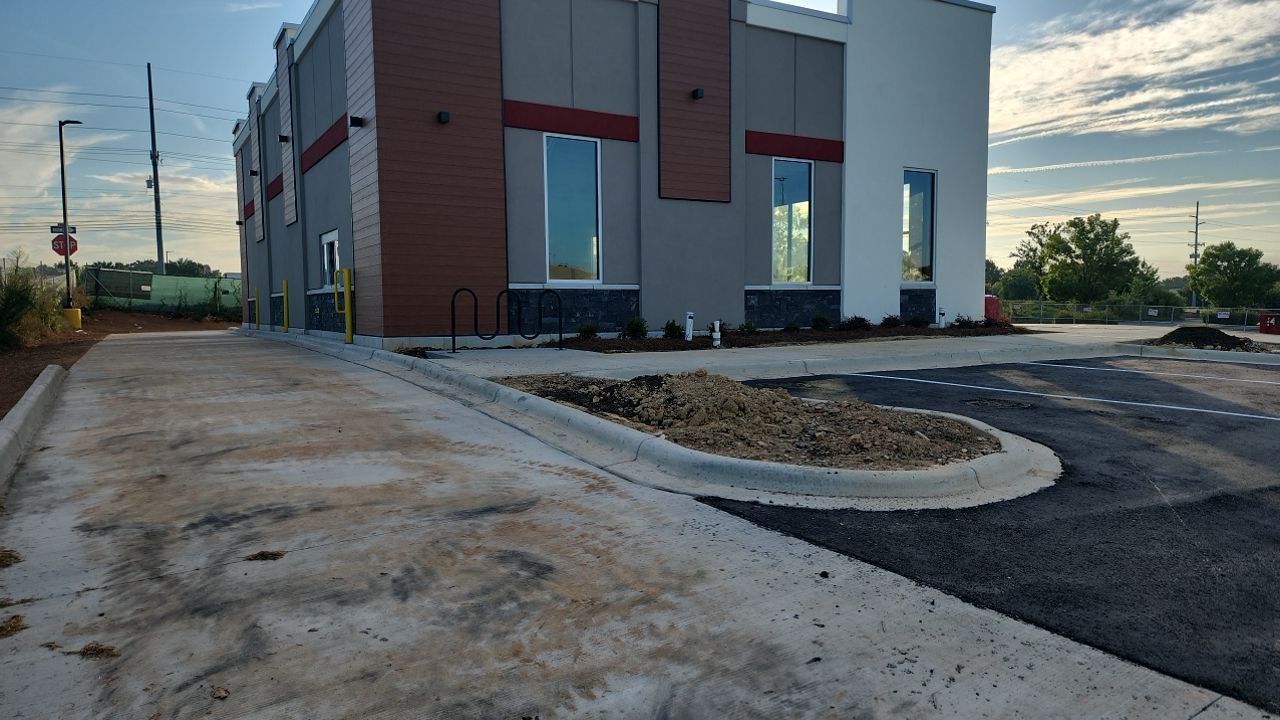 Driveway Clean using cleaner by Power Wash Masters LLC