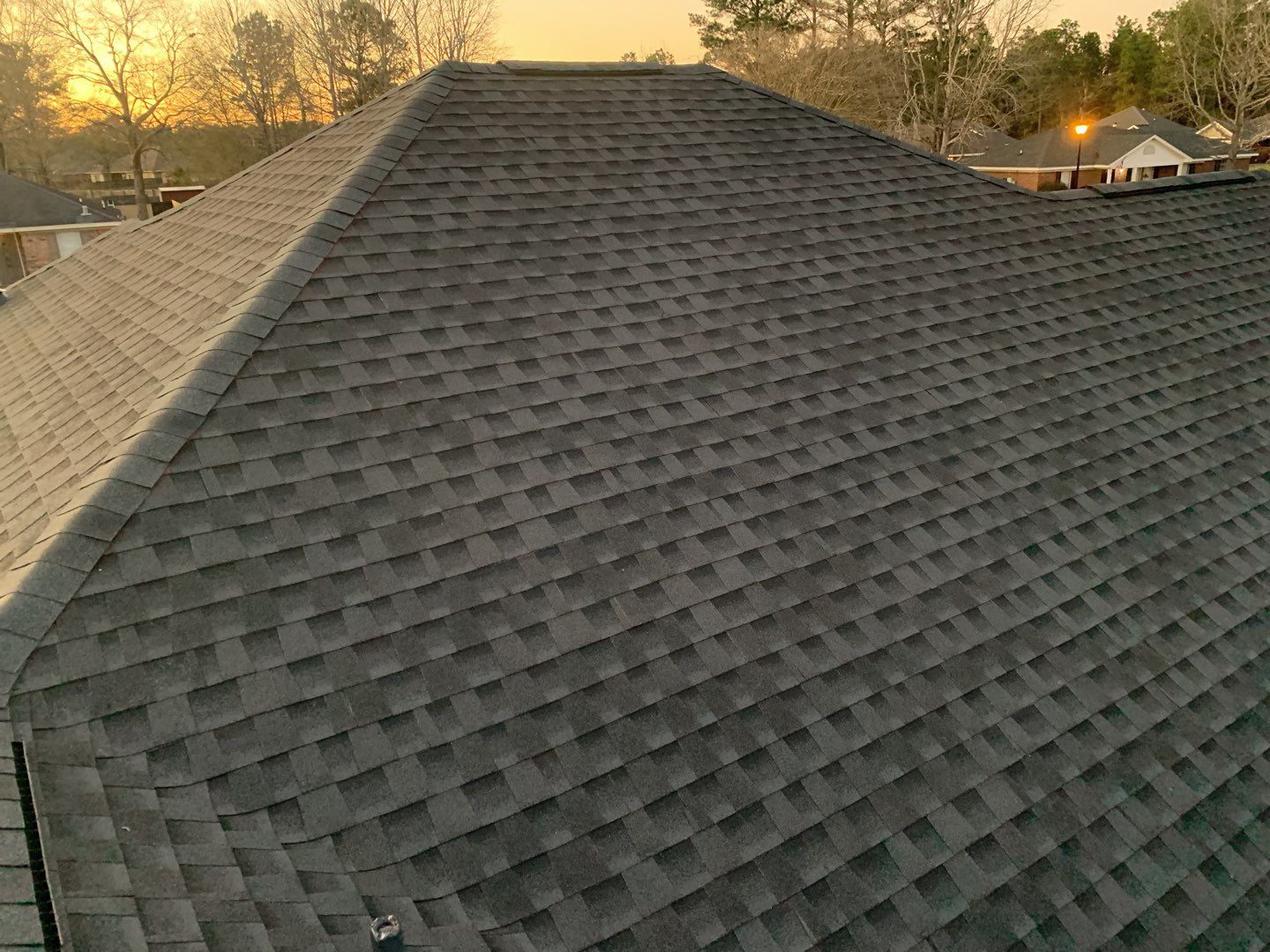 Residential Roofing Installation using Roof Replacement by American Roofing & Construction LLC