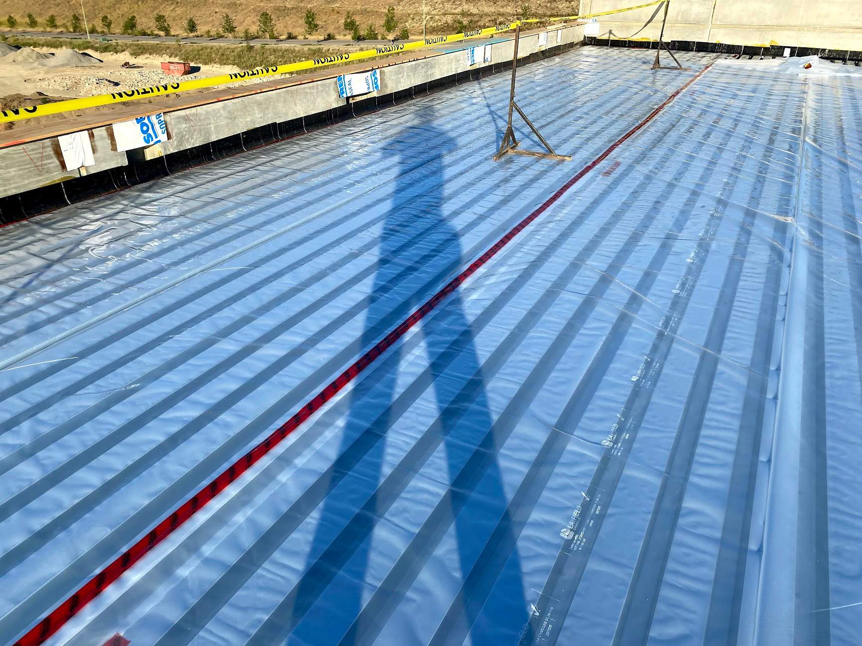 Commercial Roofing Installation using Durolast by Top Notch Roofing Inc