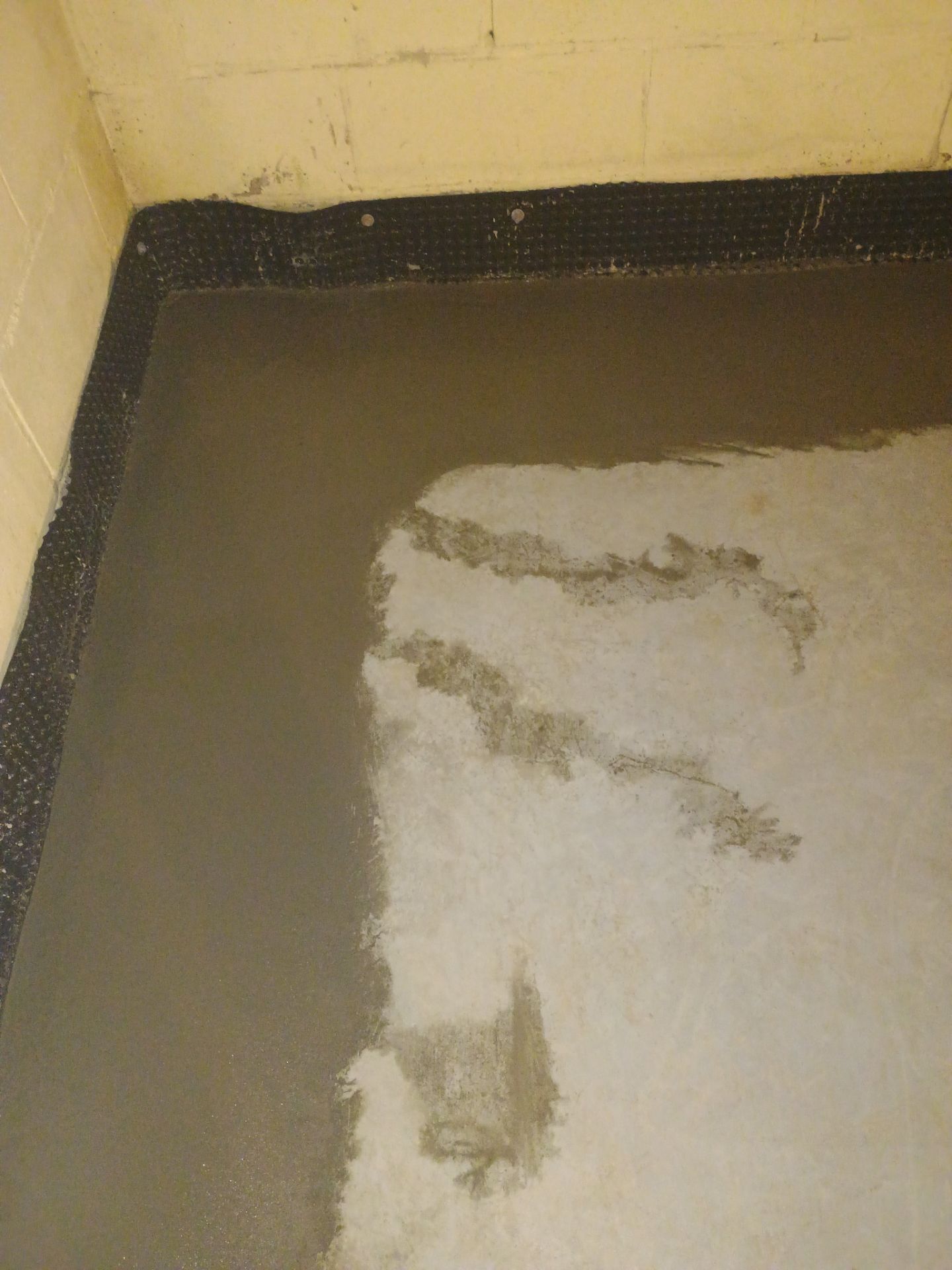 Drain Tile & Sump Pump for Kassie's Rental Property by Waterproofing Northeast