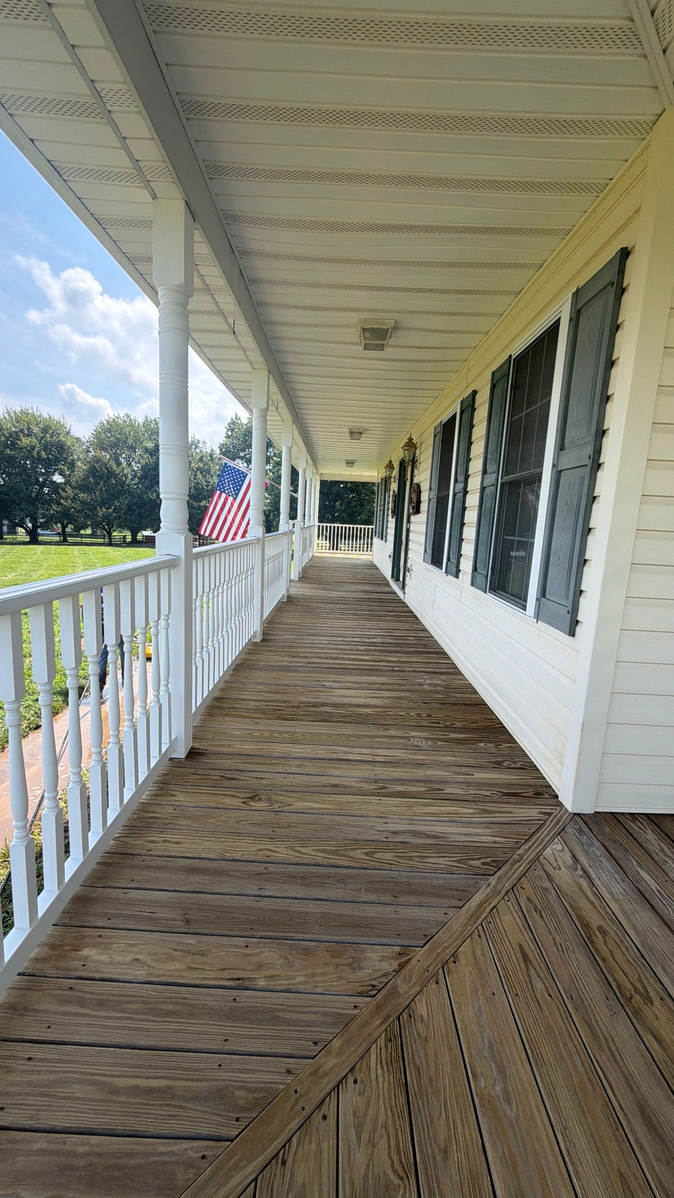Vinyl Siding House Washing and Wood Deck Restoration in Carroll County by Baltimore Pressure Washers Inc.