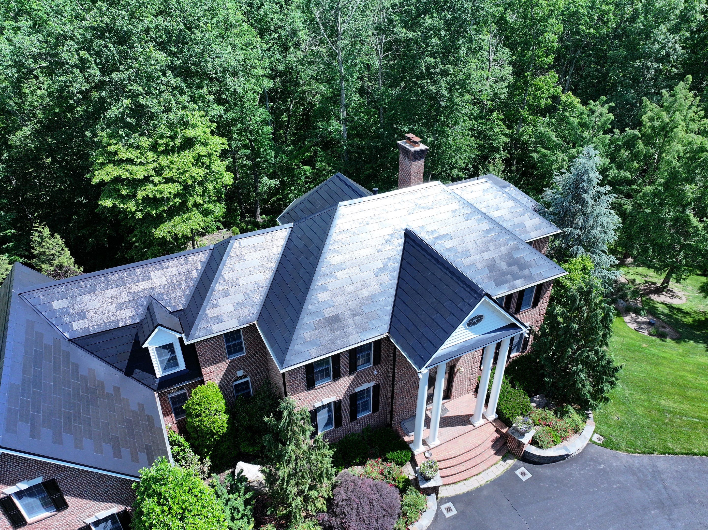 Tesla Solar Roof Replacement by American Home Contractors