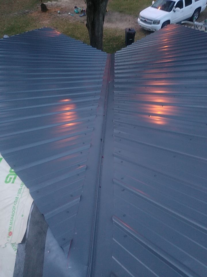 Residential Roofing Installation using Roof Replacement by American Roofing & Construction LLC