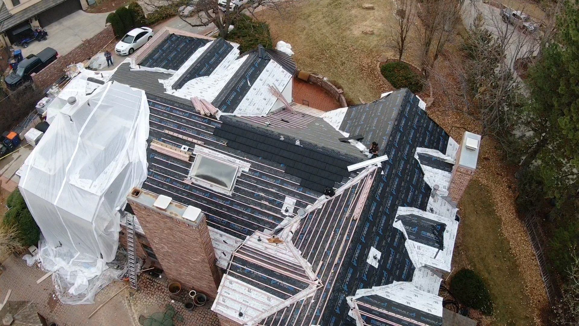 Unified Stone Coated Roof & Stucco Remodle by Blue Peaks Roofing LLC