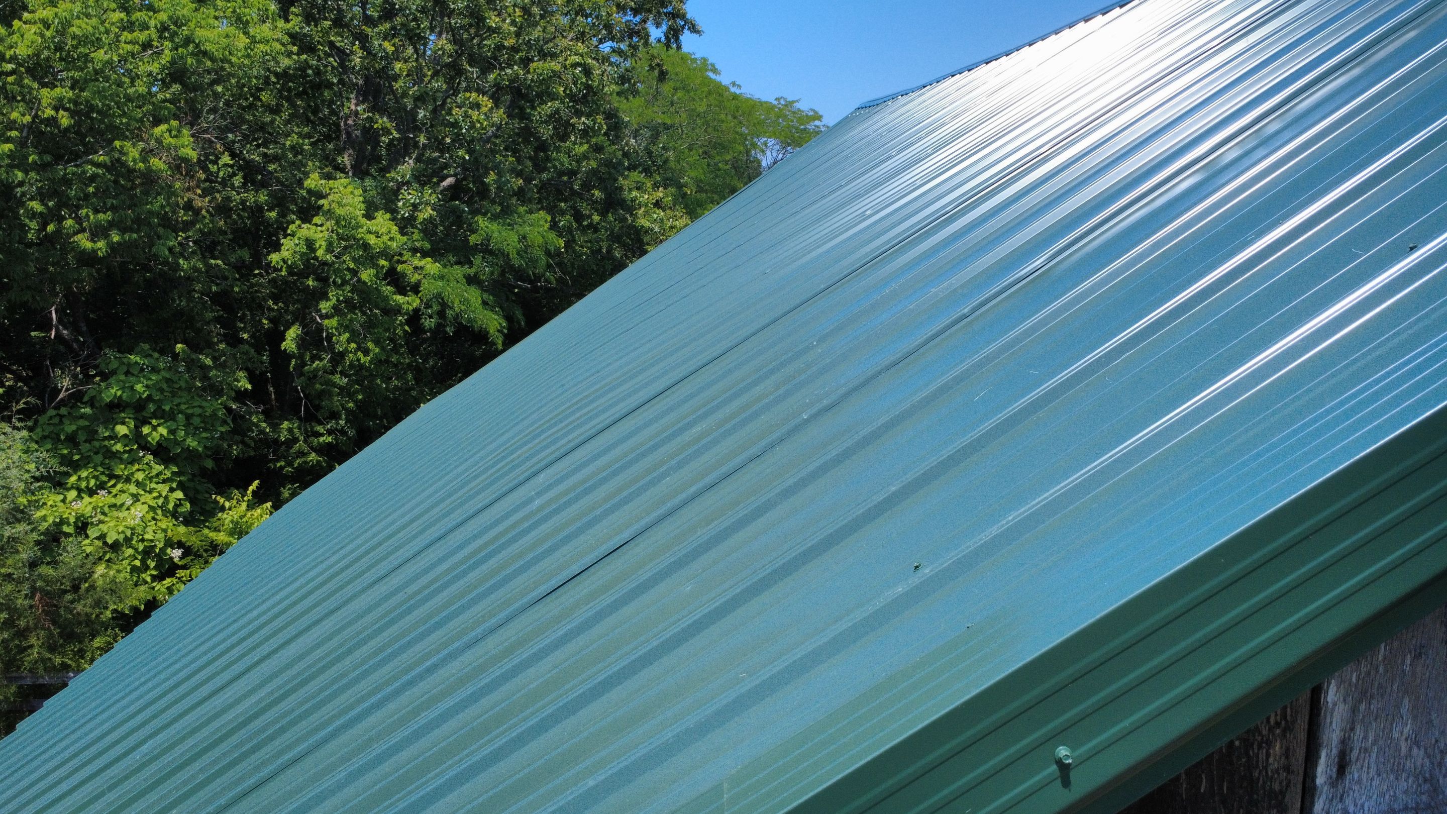 29 Gauge G-Rib Metal Roof Install - Color Evergreen  by Titan Commercial & Residential Roofing 