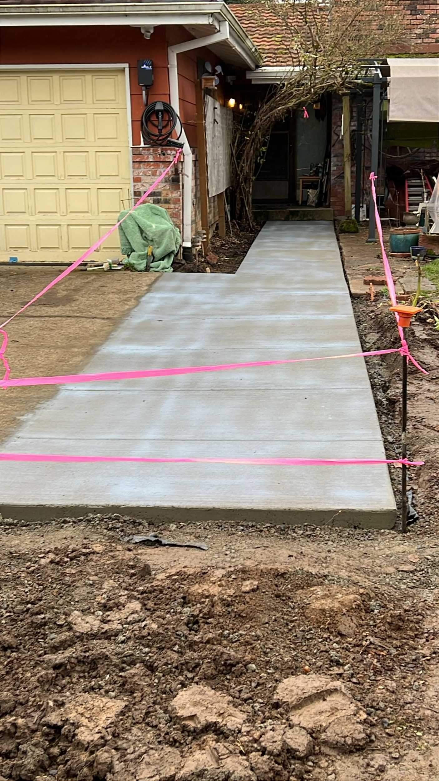 Oregon City Residential Concrete Walkway and Driveway Extension by American Made Construction 