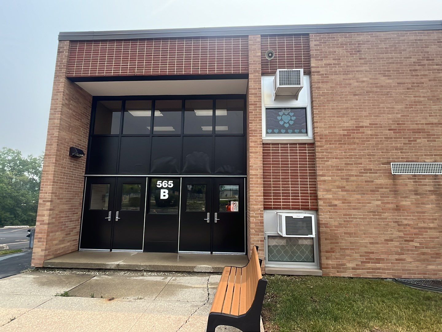 Commercial brick exterior cleaning by Northern Power Washing LLC.