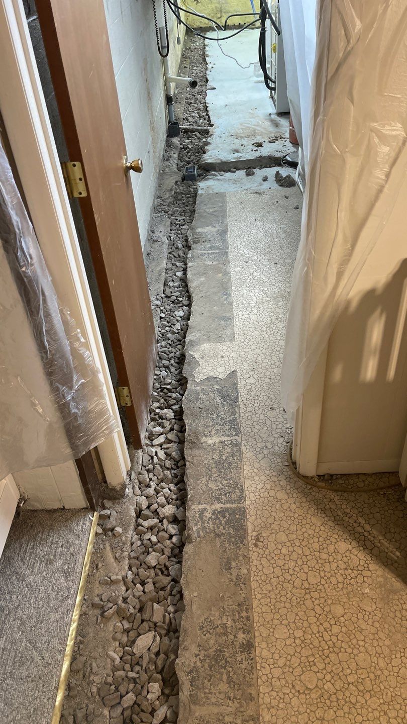 Interior Waterproofing Using GrateDrain™ Products by Toledo Basement Repair