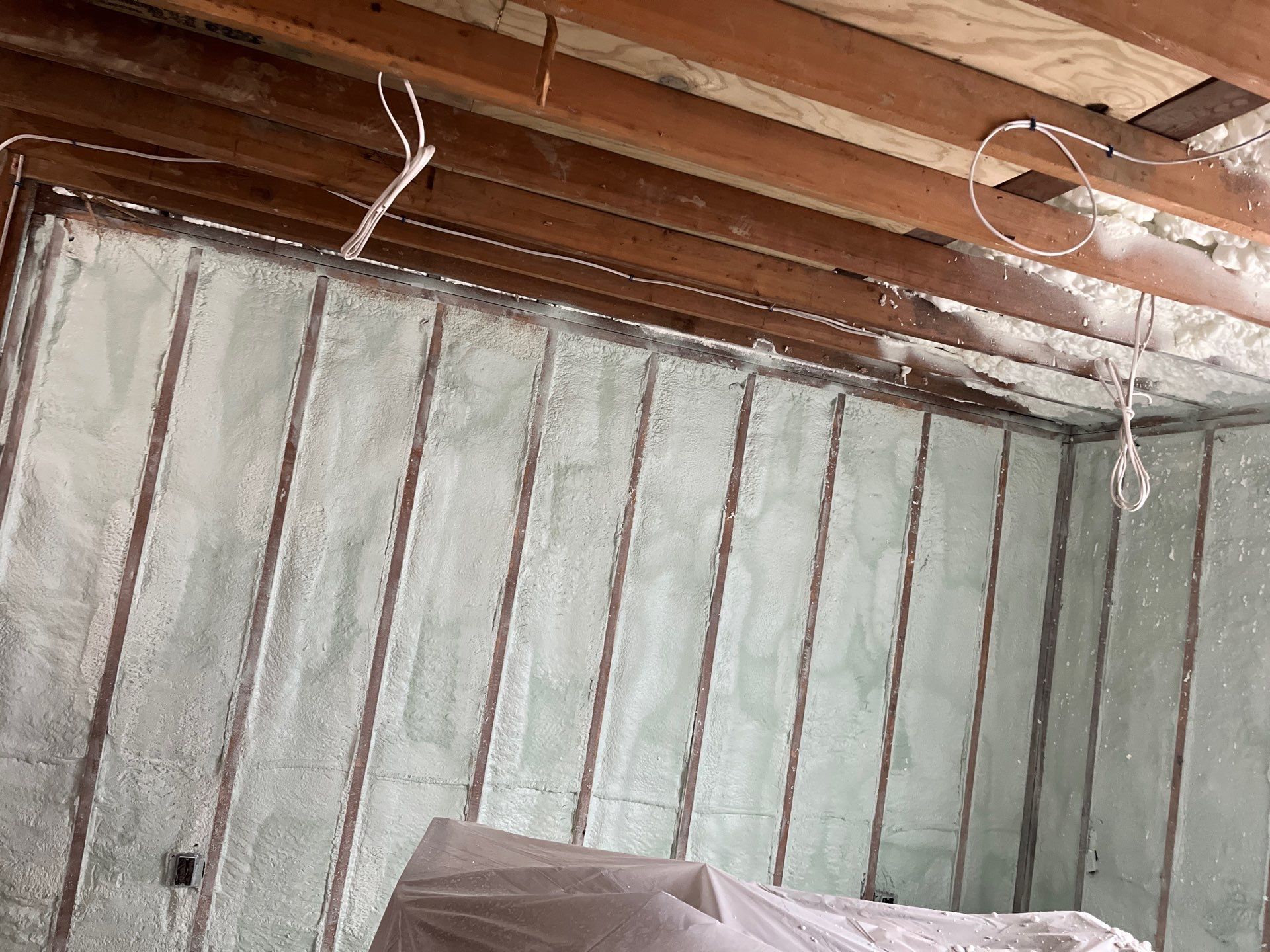 Basement Exterior Walls using Closed Cell Spray Foam by NYS Foam & Energy