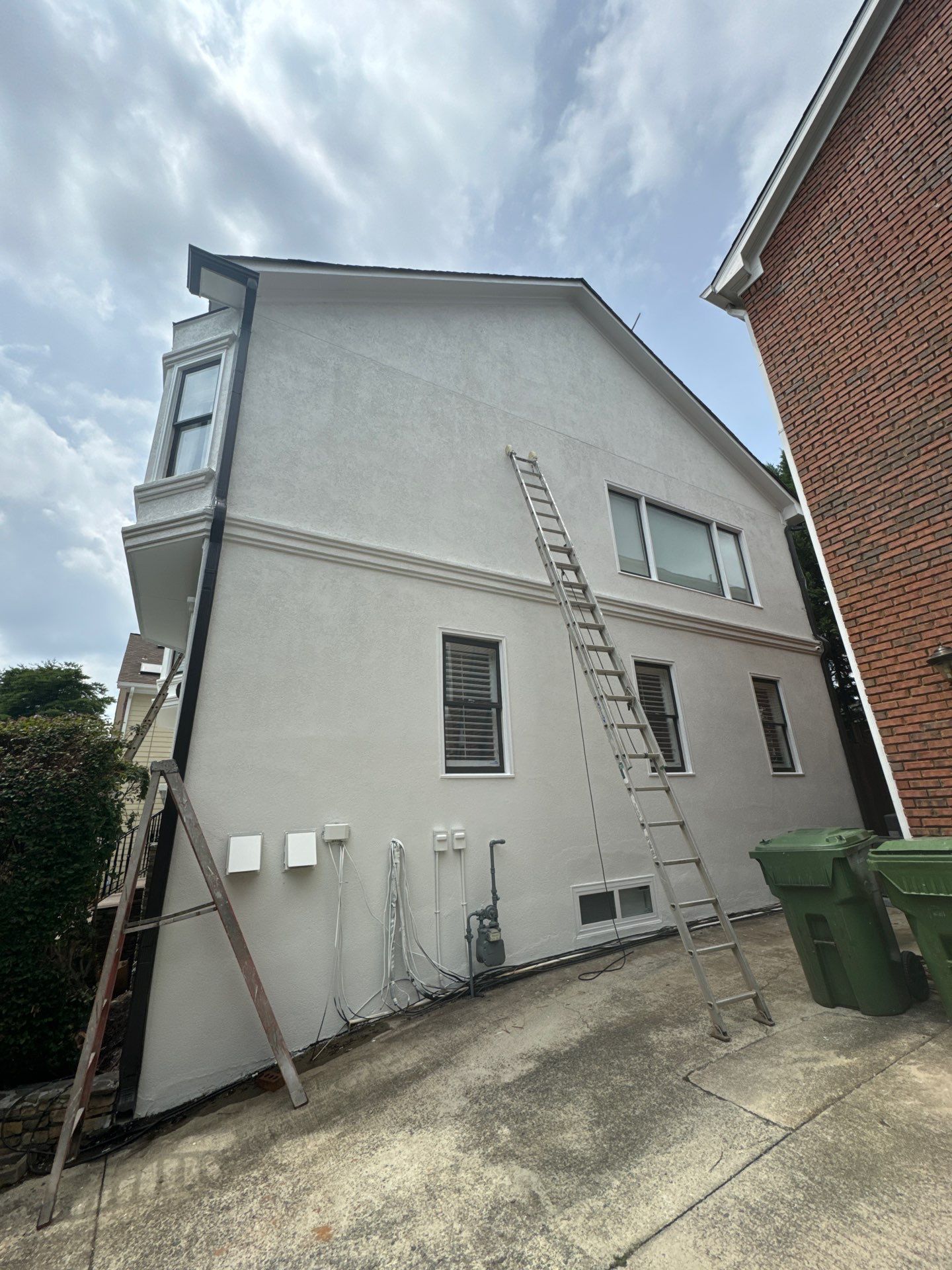 Full Exterior Stucco Painting and Wood Deck Staining in Atlanta by Swift Home Renovations