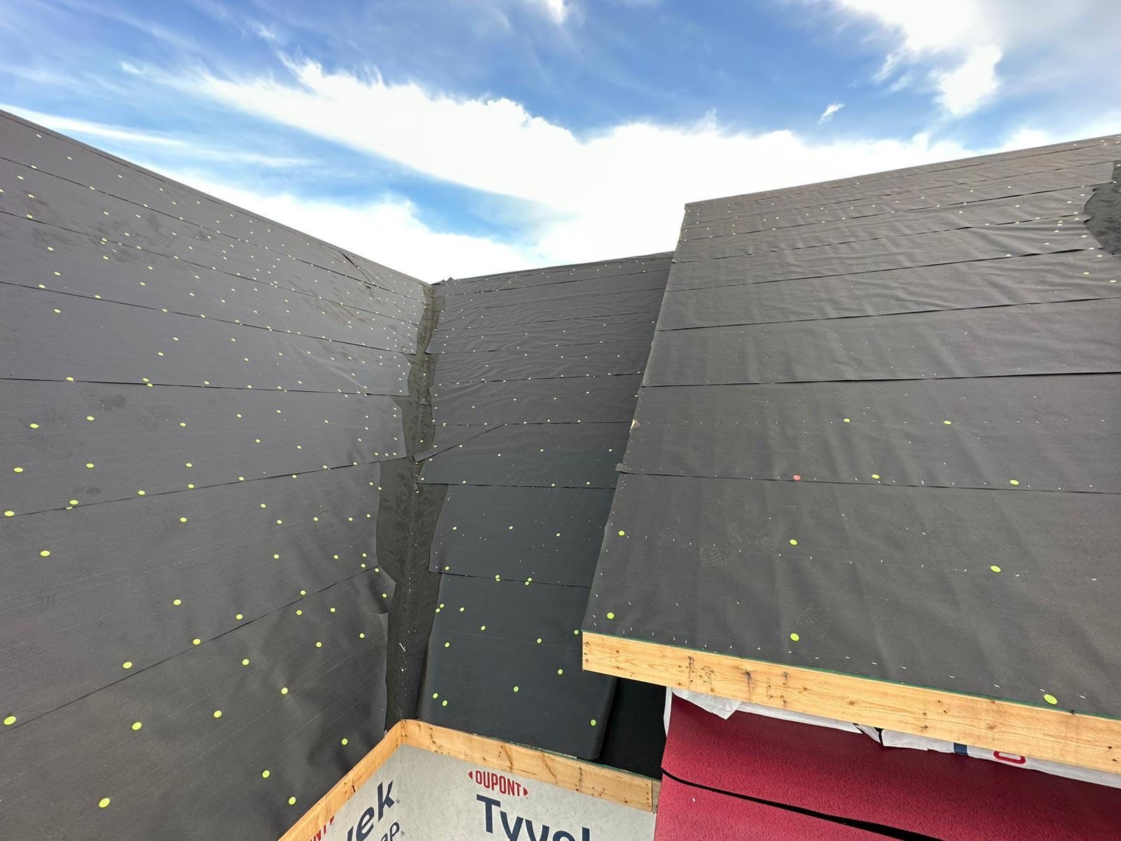 Residential Roofing Installation using Tamko Heritage AR with Standing Seam Metal Porch by Undersun Roofing 