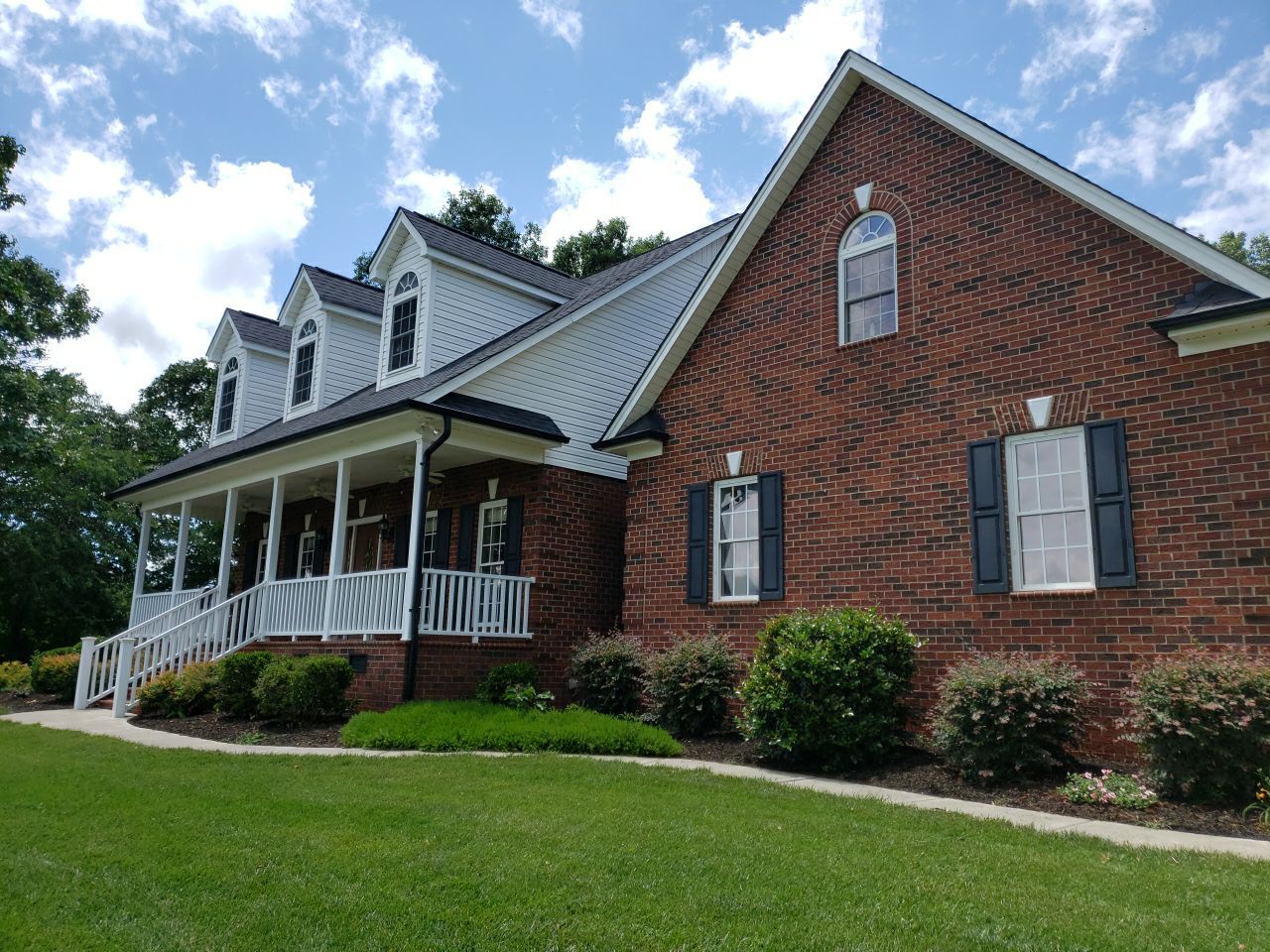 House Wash using cleaner by Power Wash Masters LLC