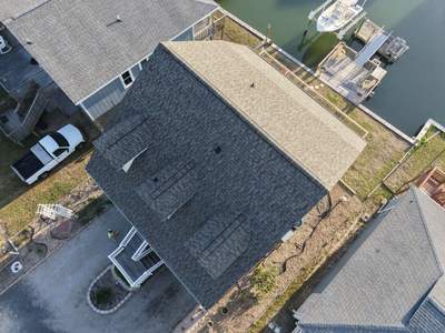 Holden Beach Canal-Side FORTIFIED Roof Replacement with Coastal Blue Shingles