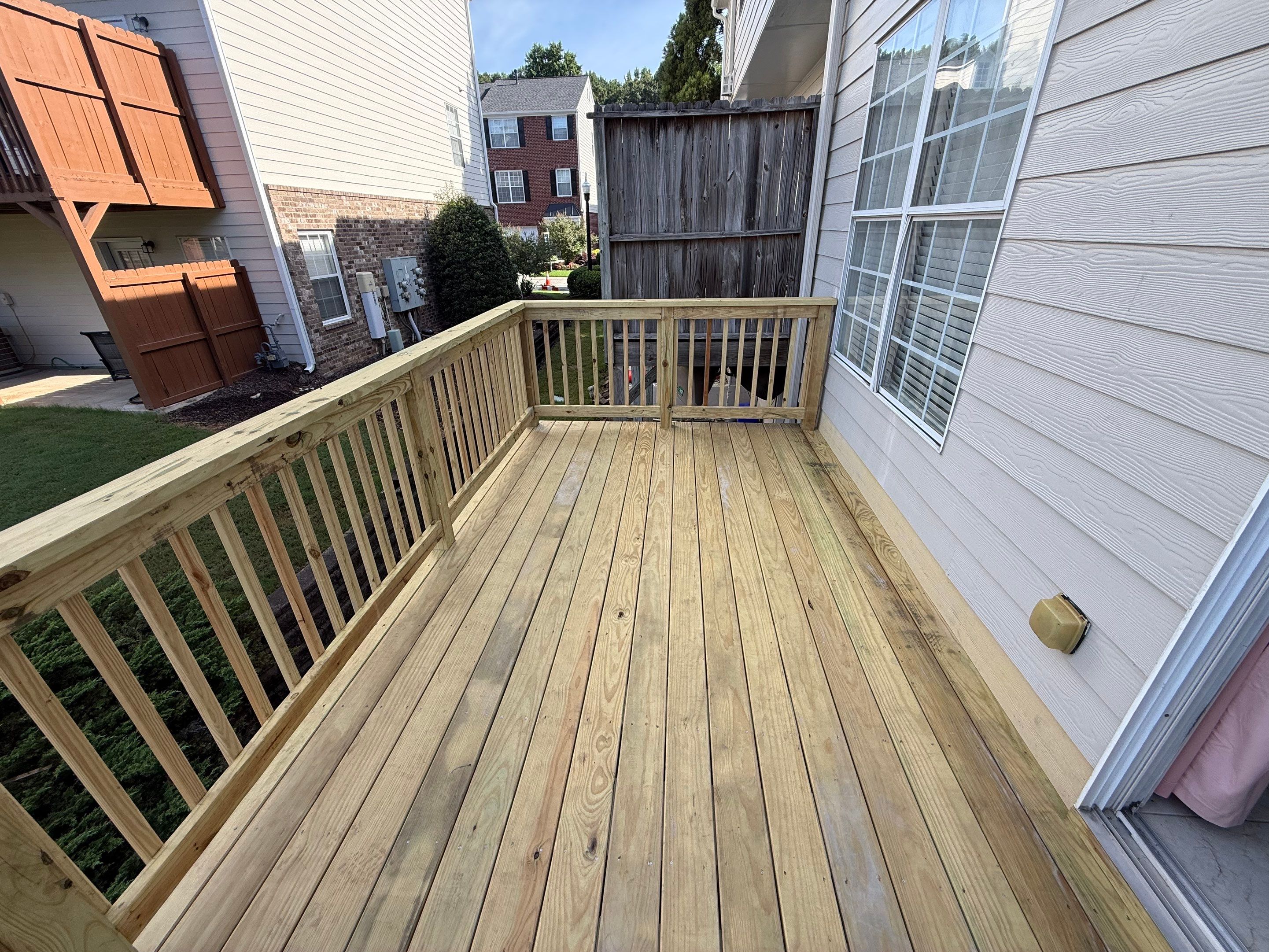 Elevated Pressure-Treated Wood Deck Replacement in Atlanta by Swift Home Renovations
