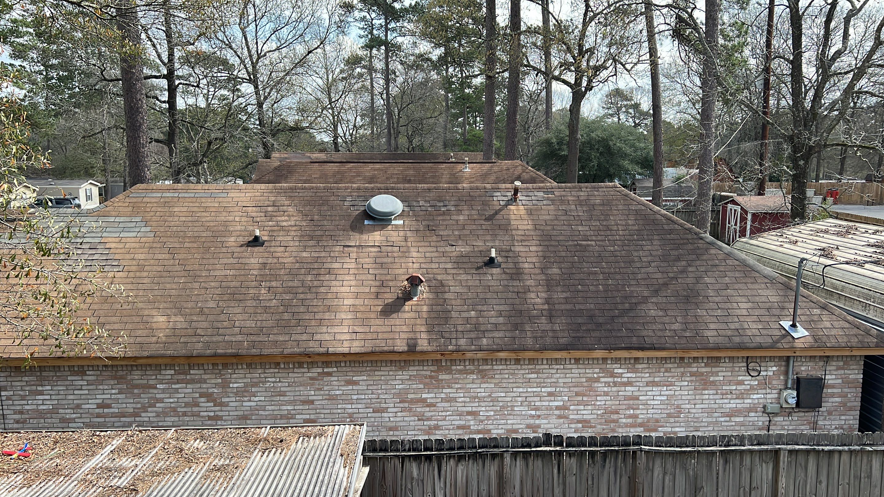 Moss-Covered Roof Made New — Conroe, TX by PL Roofing & SB Roofing, LLC.