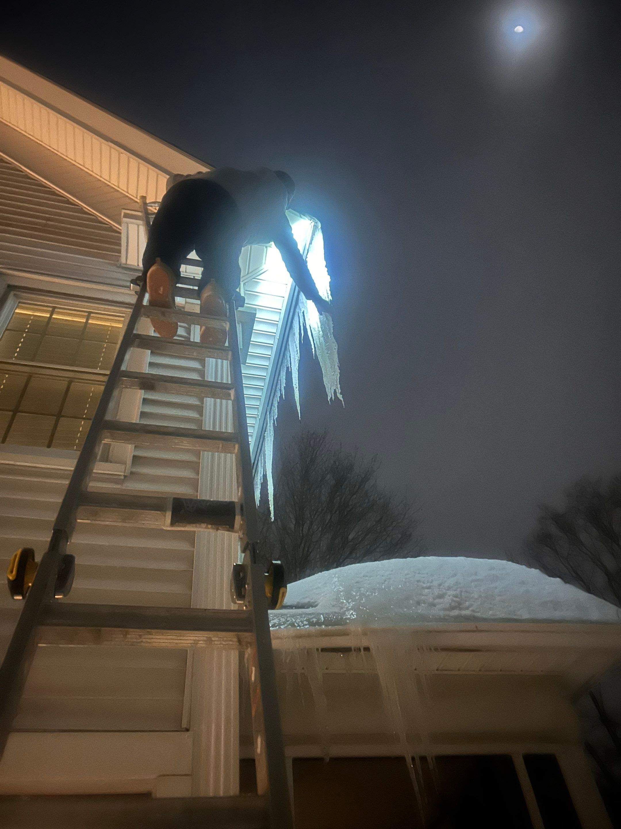 Snow and Ice dam removal by Mighty Dog Roofing of Greater Middlesex County