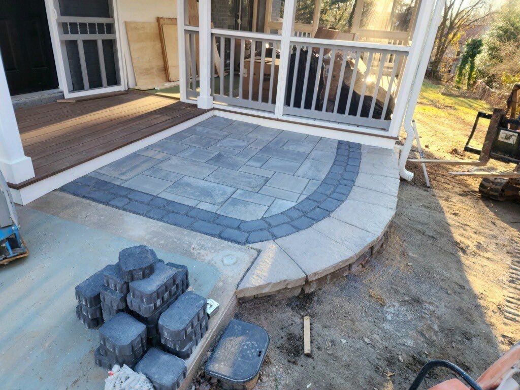 Retaining wall, walkway, small patio and landscape install by The Smet Companies, LLC
