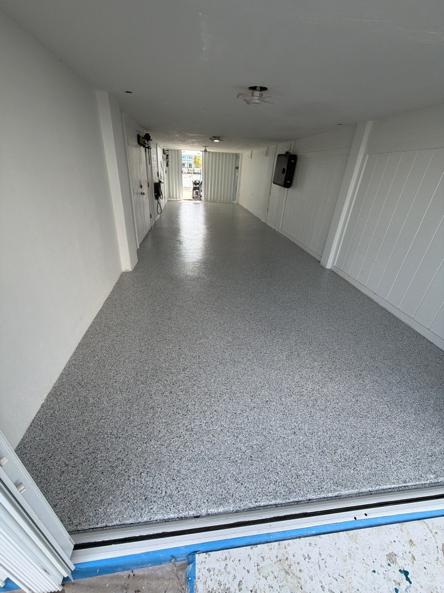 “Tidal Wave” Carport Garage in Marathon, FL by Tropical Epoxy Coatings & Creations LLC