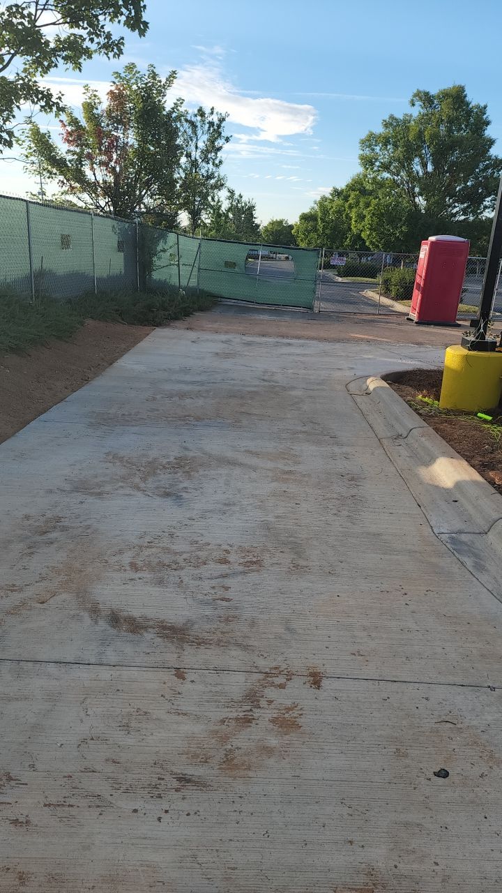 Driveway Clean using cleaner by Power Wash Masters LLC