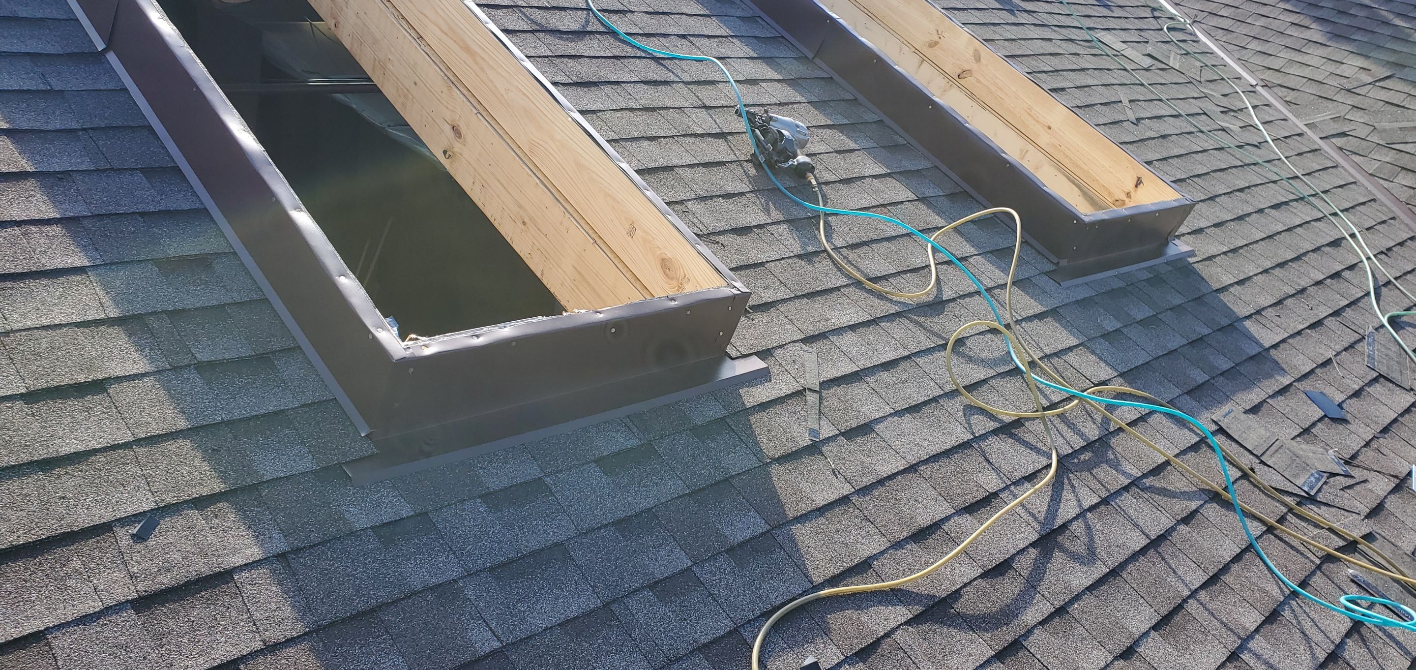 Skylight removal and install  by Absolute Roofing and Construction