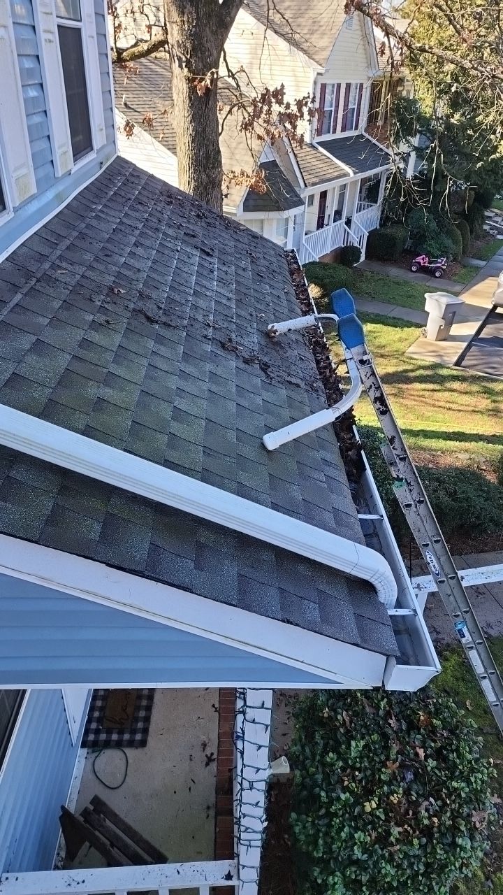 Gutter Cleaning using water by Power Wash Masters LLC