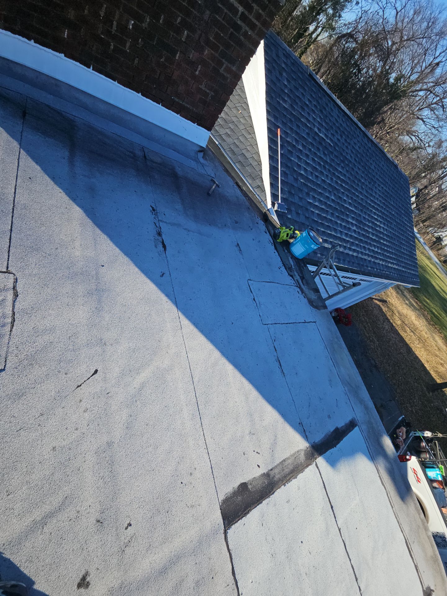 Flat Roof Repair by Real1Construction