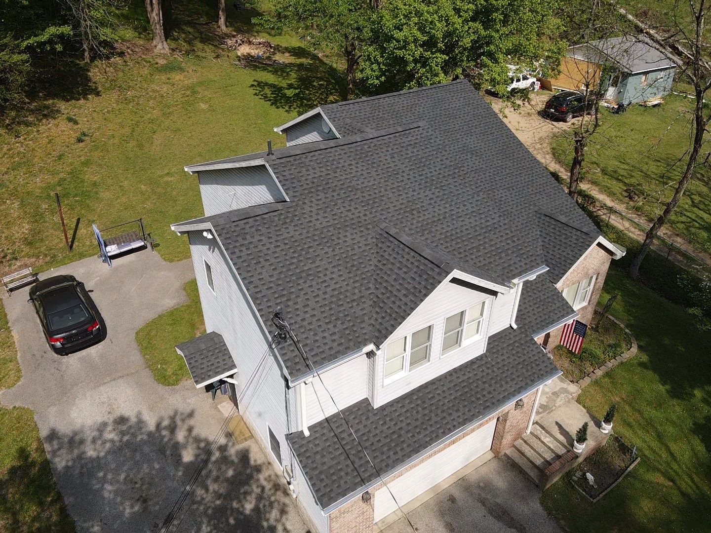Residential Roofing Installation using GAF Timberline HDZ Charcoal by Rainstoppers Roofing