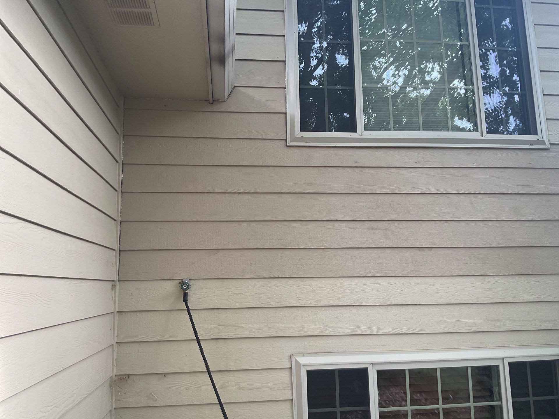 Sioux Falls Exterior Siding Replacement and Custom Deck Upgrade by Select Painting, Coatings & Garage Cabinets
