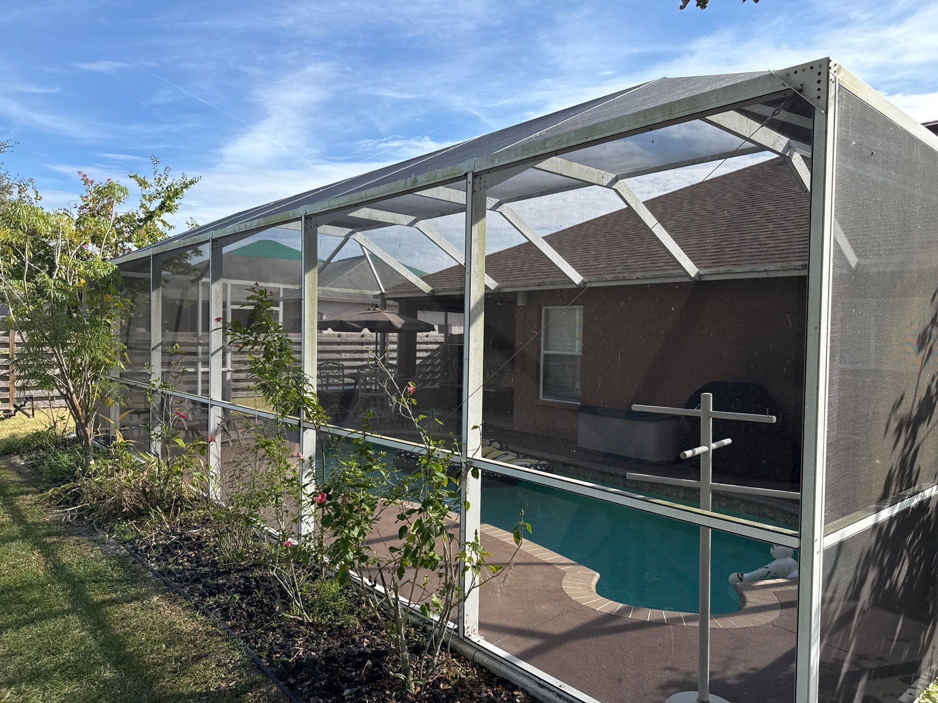 Driveway, Sidewalk, Street Curbing & Pool Screen Enclosure Cleaning in Regency Oaks, Palmetto, FL | Sunshine AquaWash by Sunshine AquaWash
