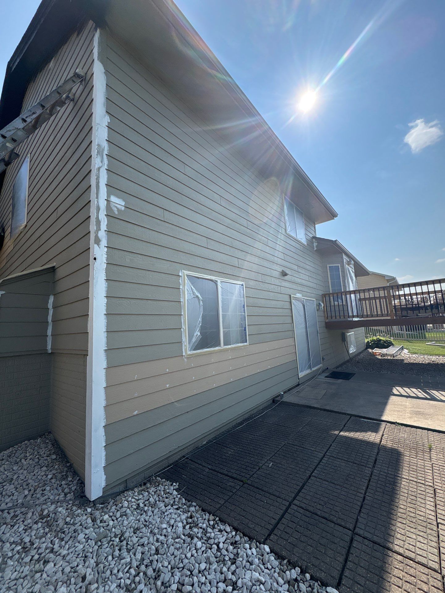 Residential Exterior Painting and Siding Refresh in Sioux Falls by Select Painting, Coatings & Garage Cabinets