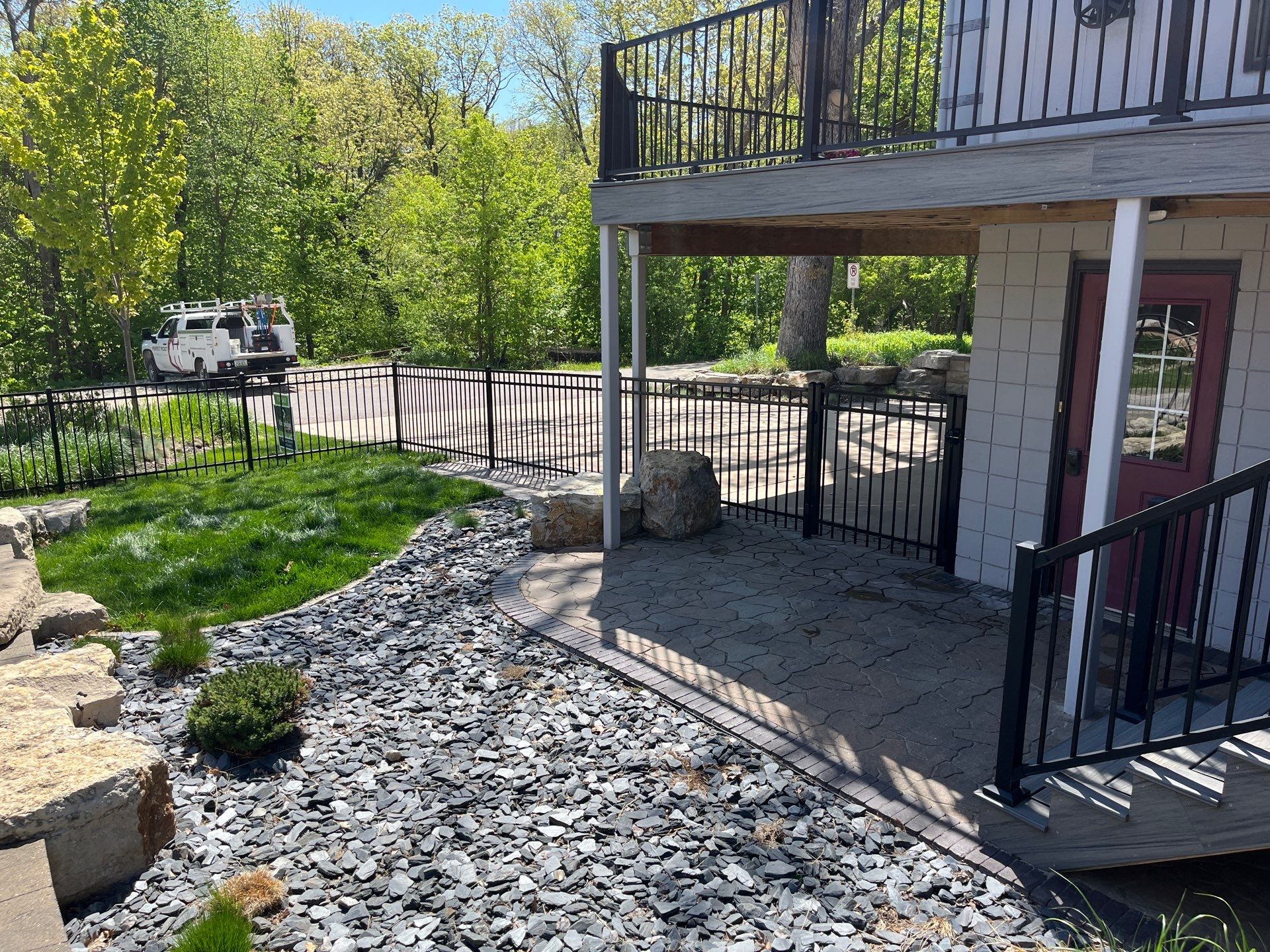 Ornamental Black Metal Picket Fence Installation in Cedar Falls by Perfect Picket Fence and Stain
