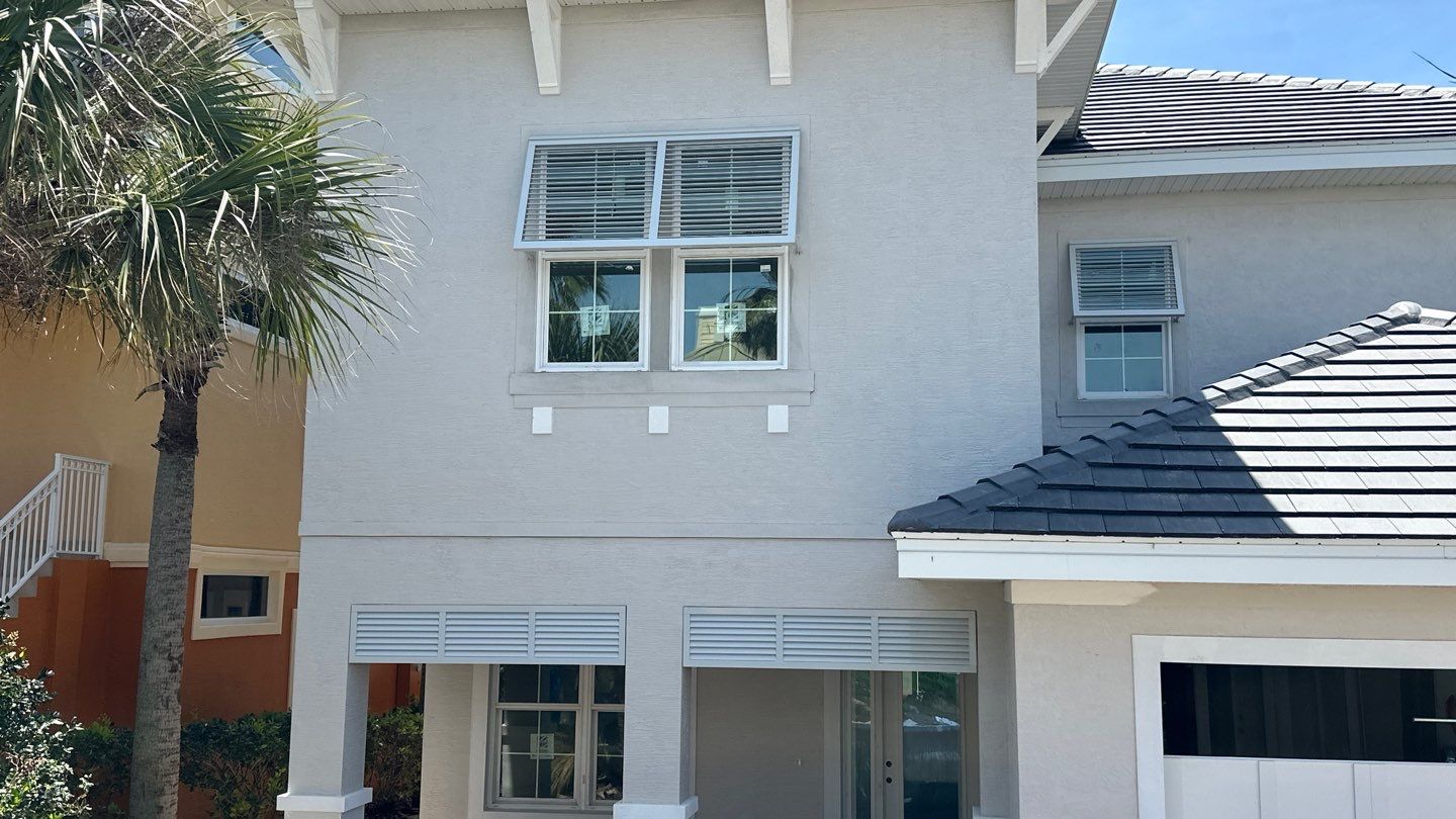 Decorative Bahamas in Papyrus White  by Smart Guard Shutters