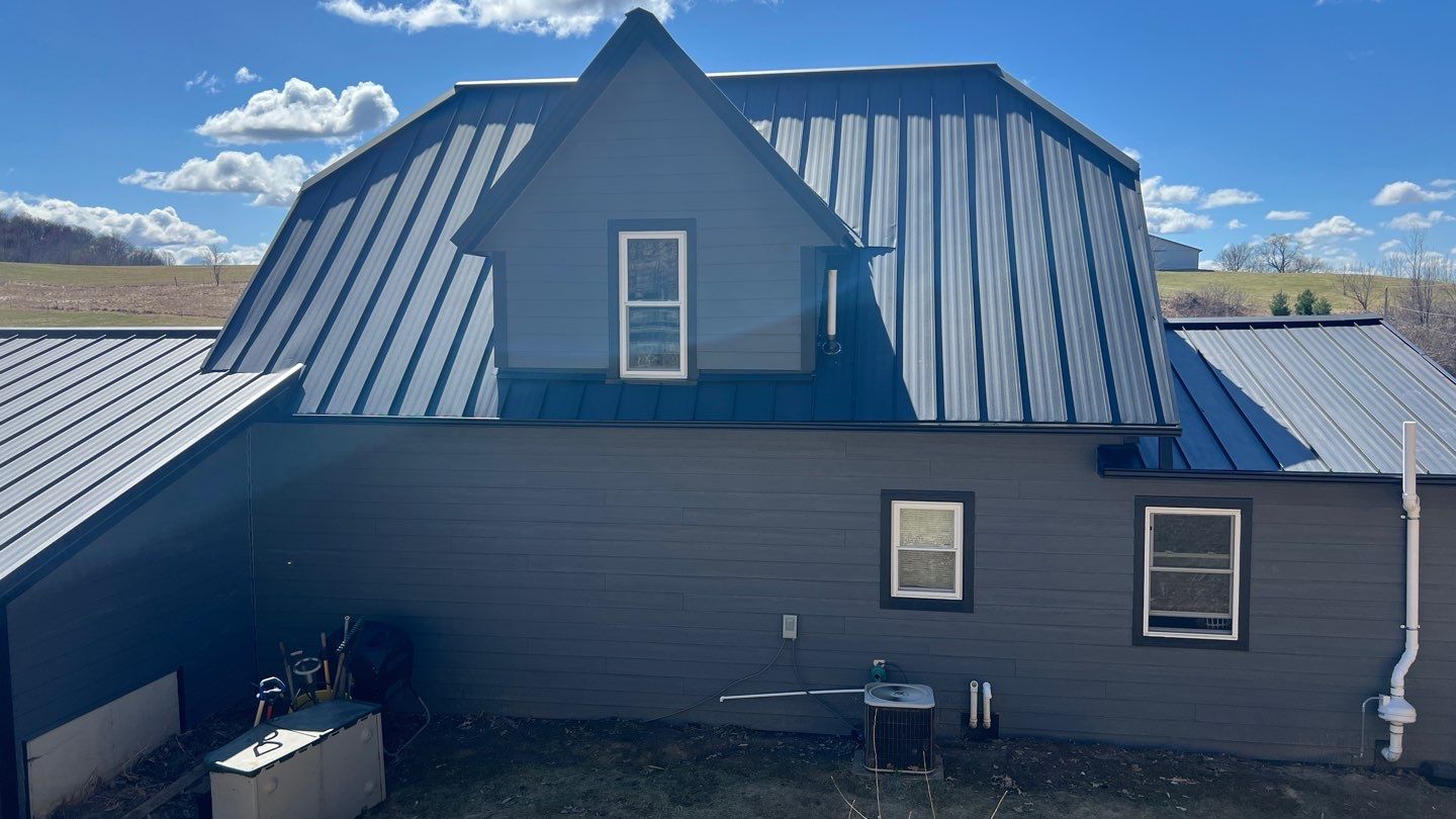  Stunning Home Exterior Makeover | Metal Roofing & LP Smart Siding by Total Restoration Services by LeFever Roofing LLC