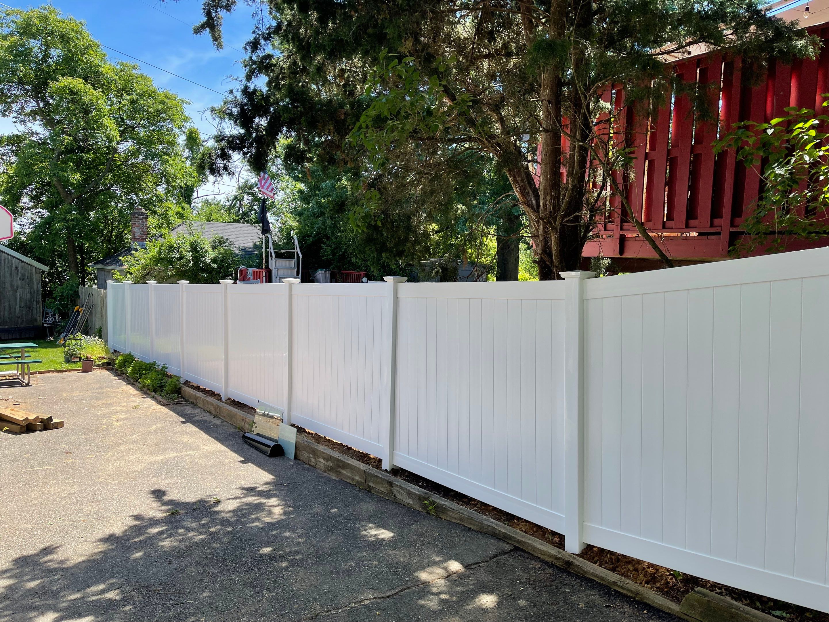 Replacement Vinyl Privacy Fence in White by DiGiorgi Roofing and Siding Inc
