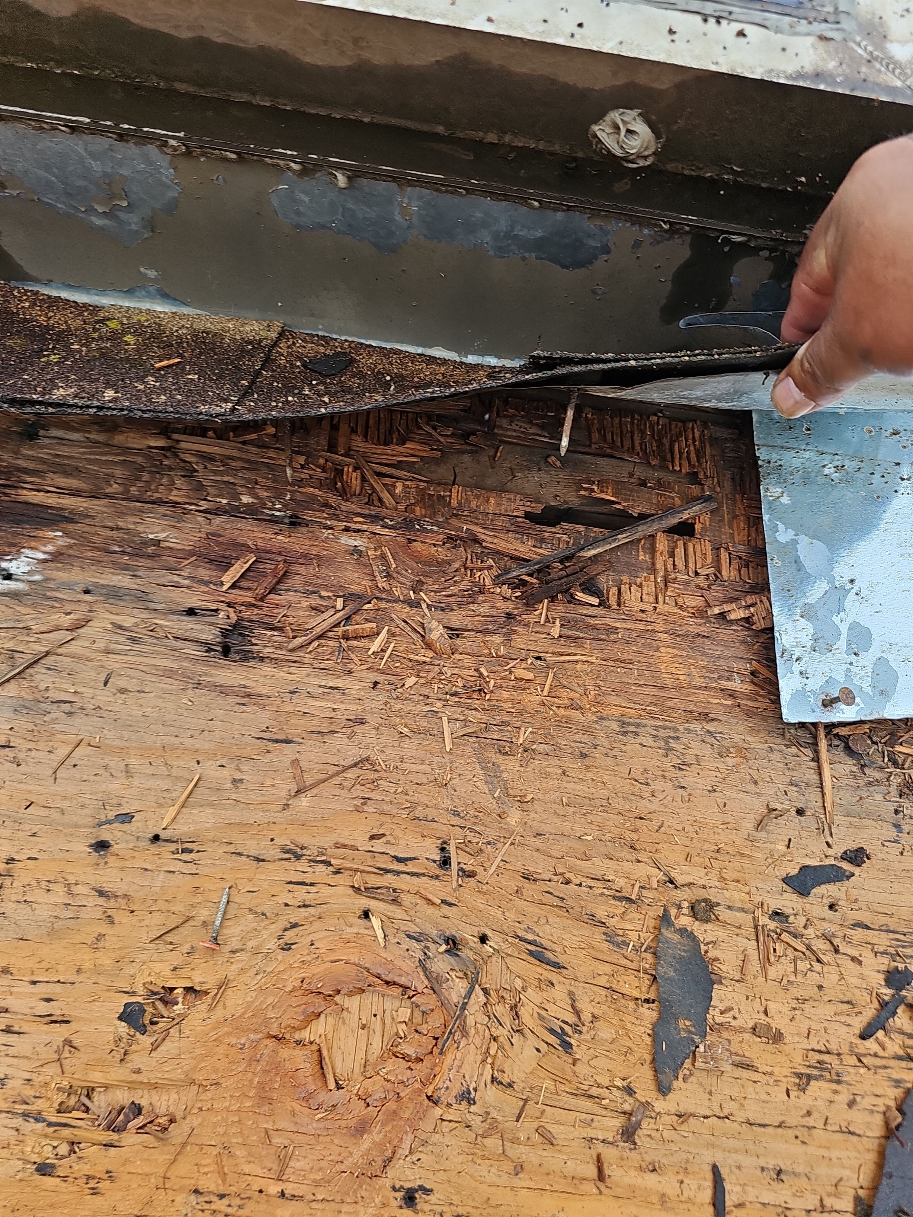 "Full Roof Replacement Due to Hail and Water Damage – Before & After" by road roofing llc
