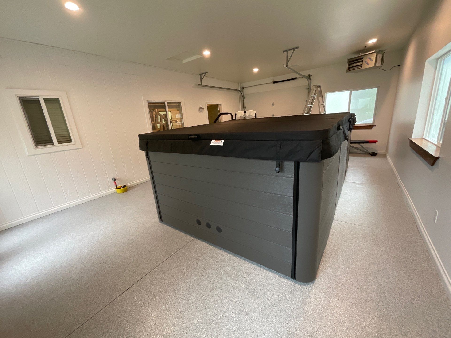 Hot Tub Installation using 1/8 Tidal Wave by Croc Coatings, LLC