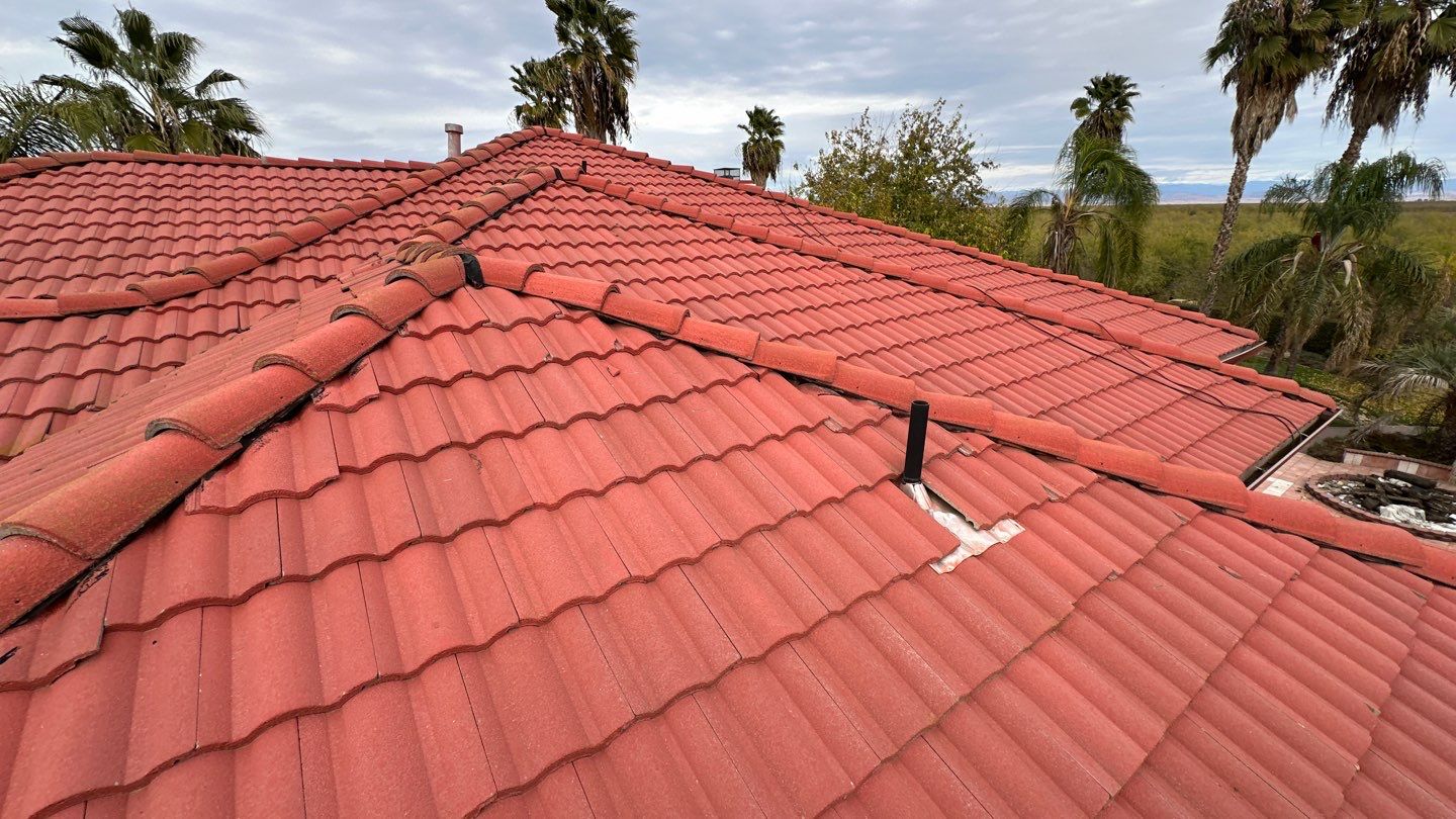 Tile refurbish project using existing tiles and replaced underlayment and battens by Straight Edge Roofing Inc