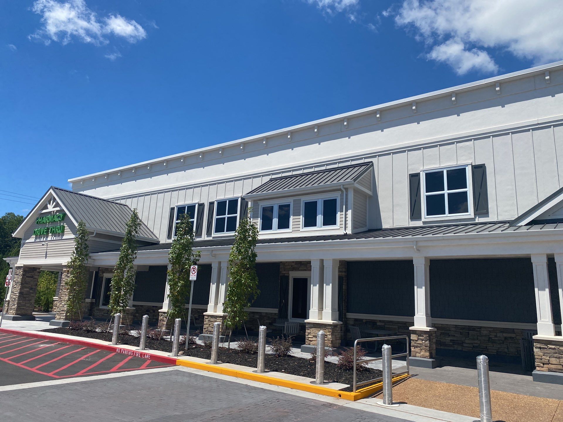 Commercial Roofing Installation using Berridge 11 1/2" Cee Lock .032 Aluminum Charcoal Grey by Infinity Metal Systems
